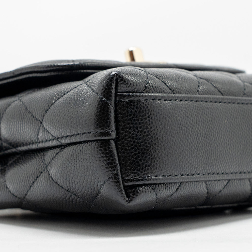 chanel-coco-handle-clutch-with-chain-caviar-black-lghw-microchip-1