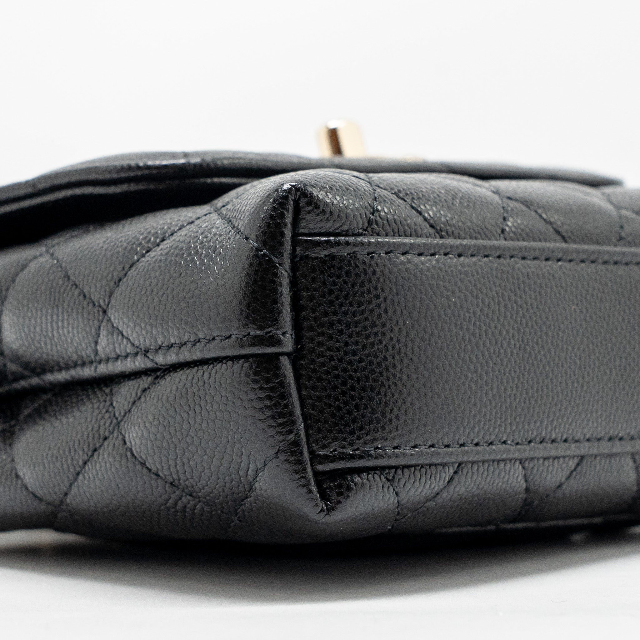 chanel-coco-handle-clutch-with-chain-caviar-black-lghw-microchip-1