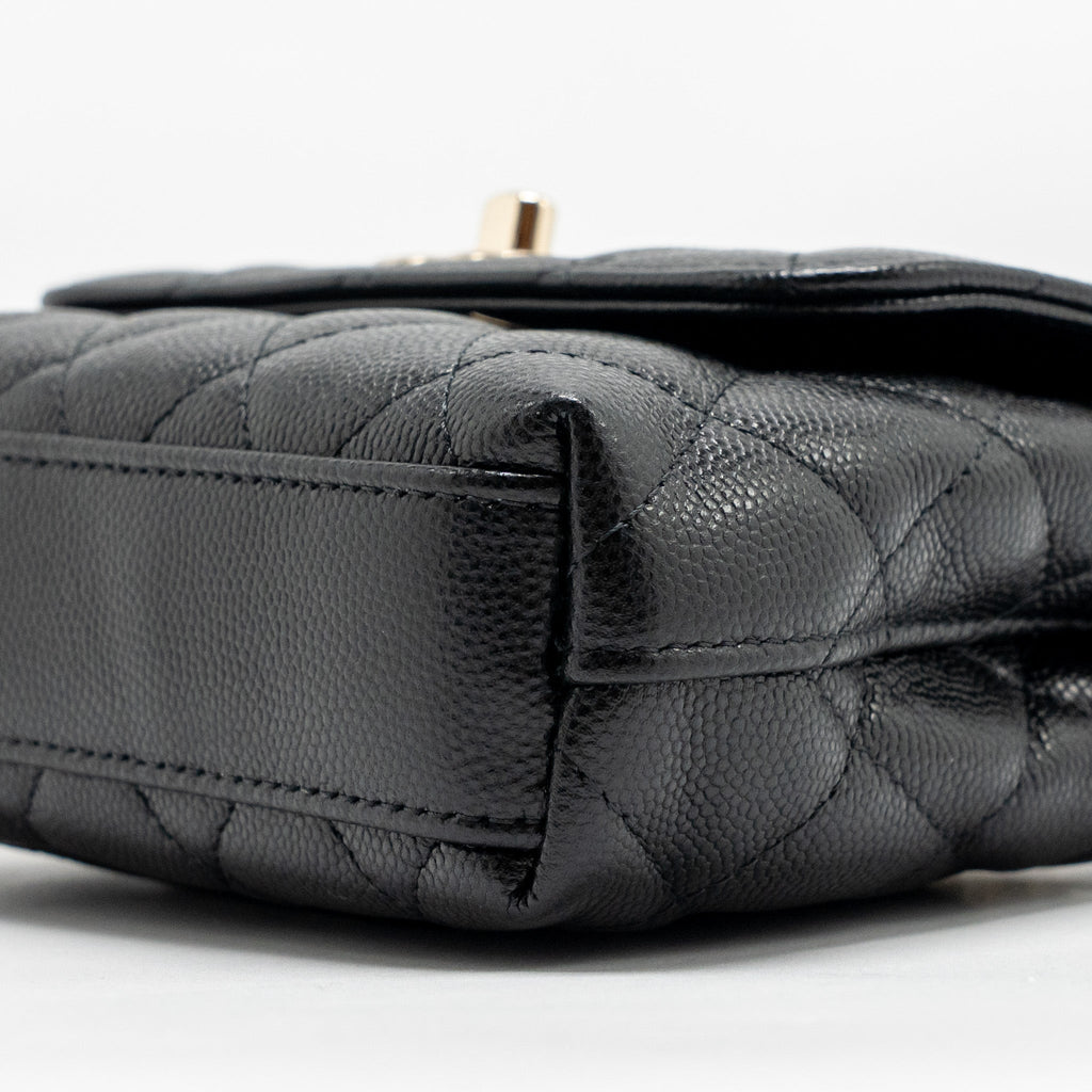 chanel-coco-handle-clutch-with-chain-caviar-black-lghw-microchip-1