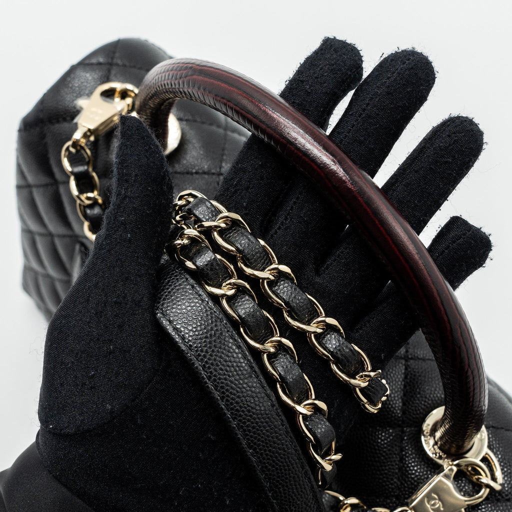chanel-medium-coco-handle-flap-bag-lizard-embossed-handle-caviar-black-lghw