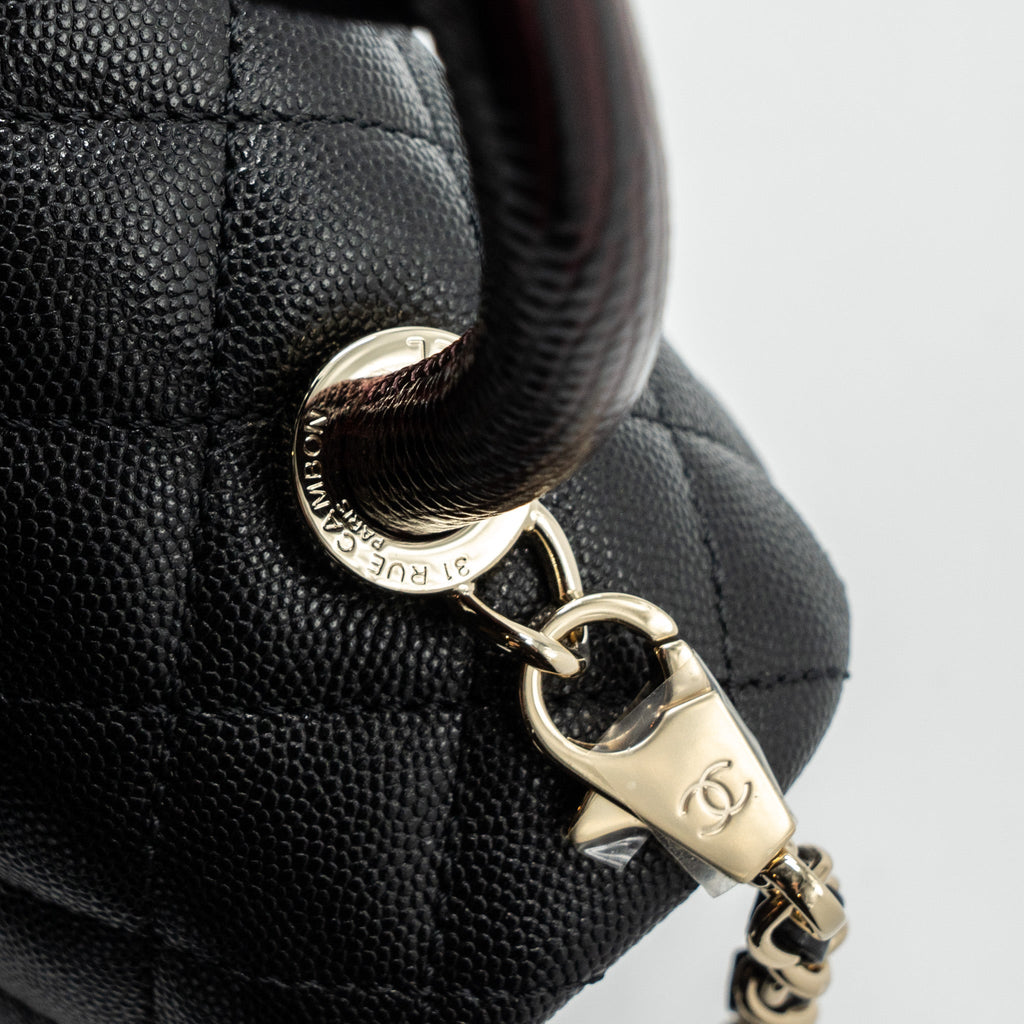 chanel-medium-coco-handle-flap-bag-lizard-embossed-handle-caviar-black-lghw