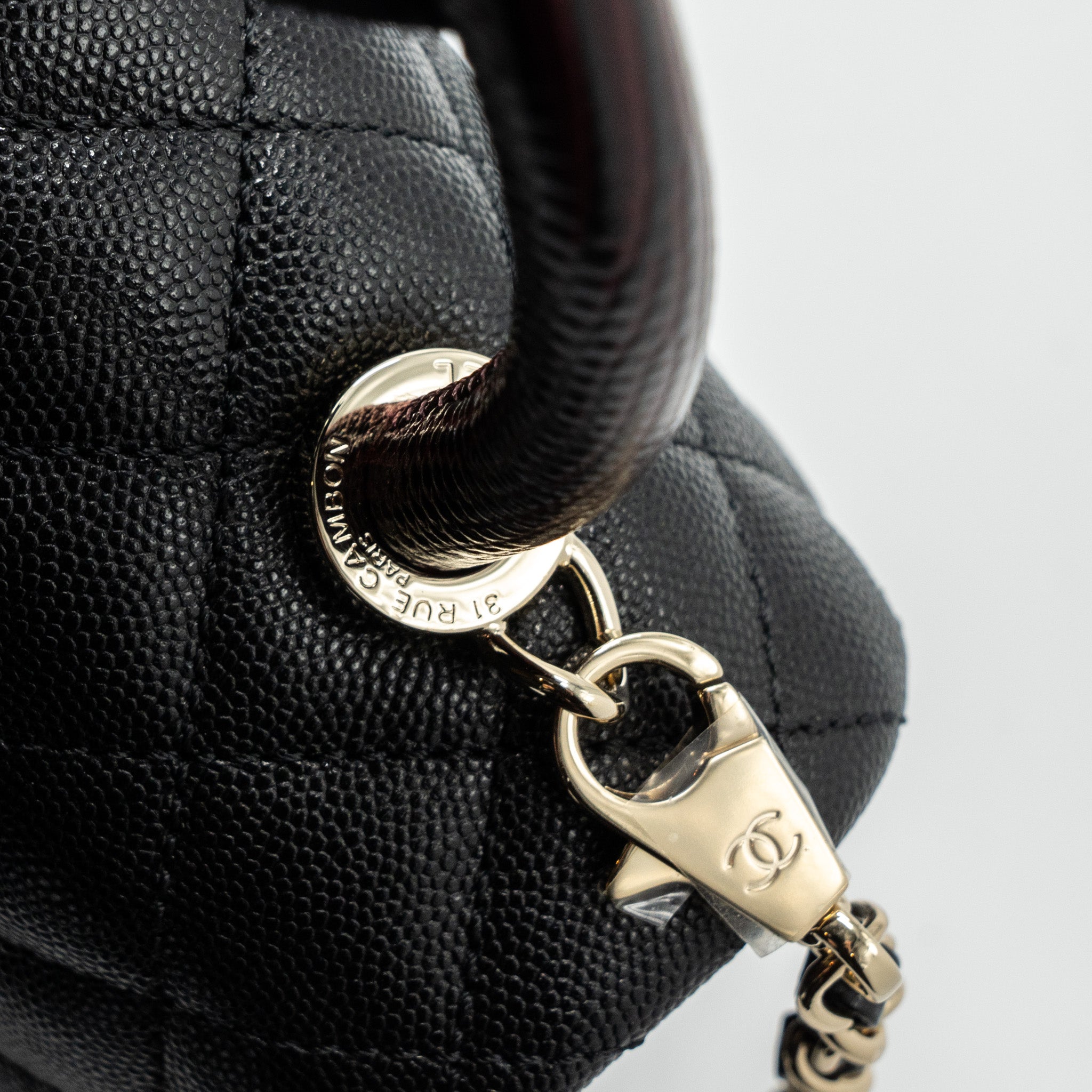 chanel-medium-coco-handle-flap-bag-lizard-embossed-handle-caviar-black-lghw