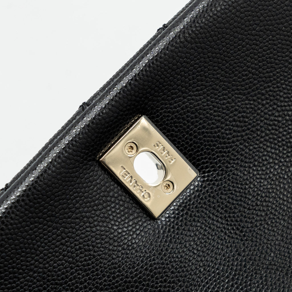 chanel-medium-coco-handle-flap-bag-lizard-embossed-handle-caviar-black-lghw