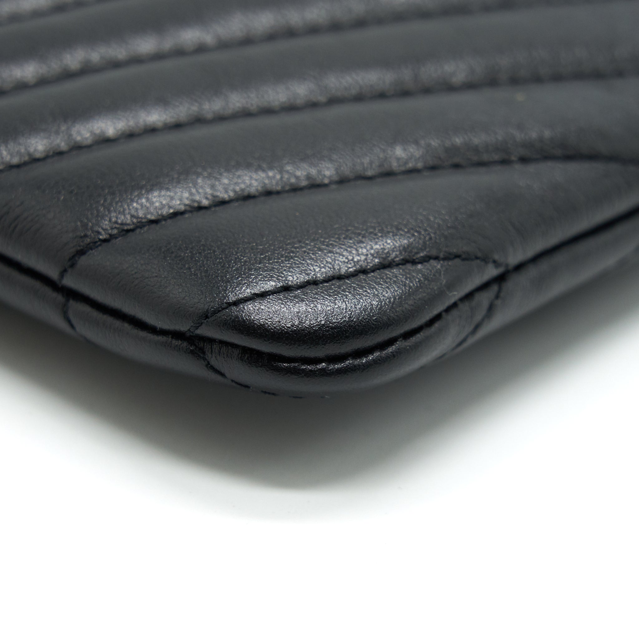 saint-laurent-monogram-quilted-leather-pouch-black-ghw