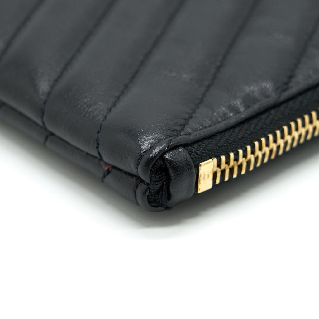 saint-laurent-monogram-quilted-leather-pouch-black-ghw