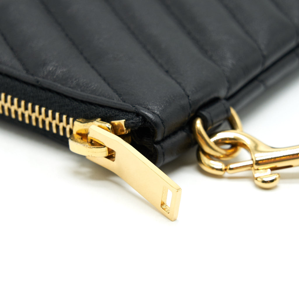 saint-laurent-monogram-quilted-leather-pouch-black-ghw