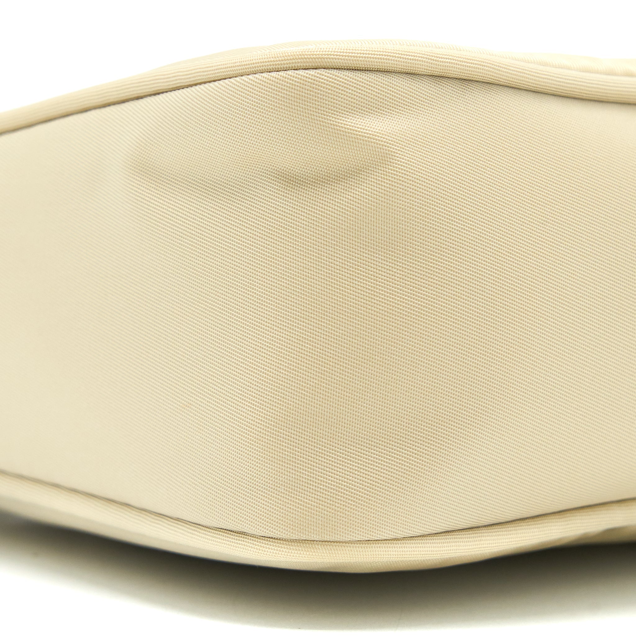 prada-re-edition-2000-mini-bag-re-nylon-desert-beige-shw