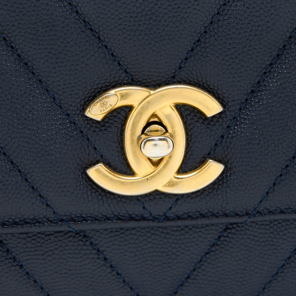chanel-medium-chevron-coco-handle-bag-caviar-with-lizard-handle-navy-brushed-ghw