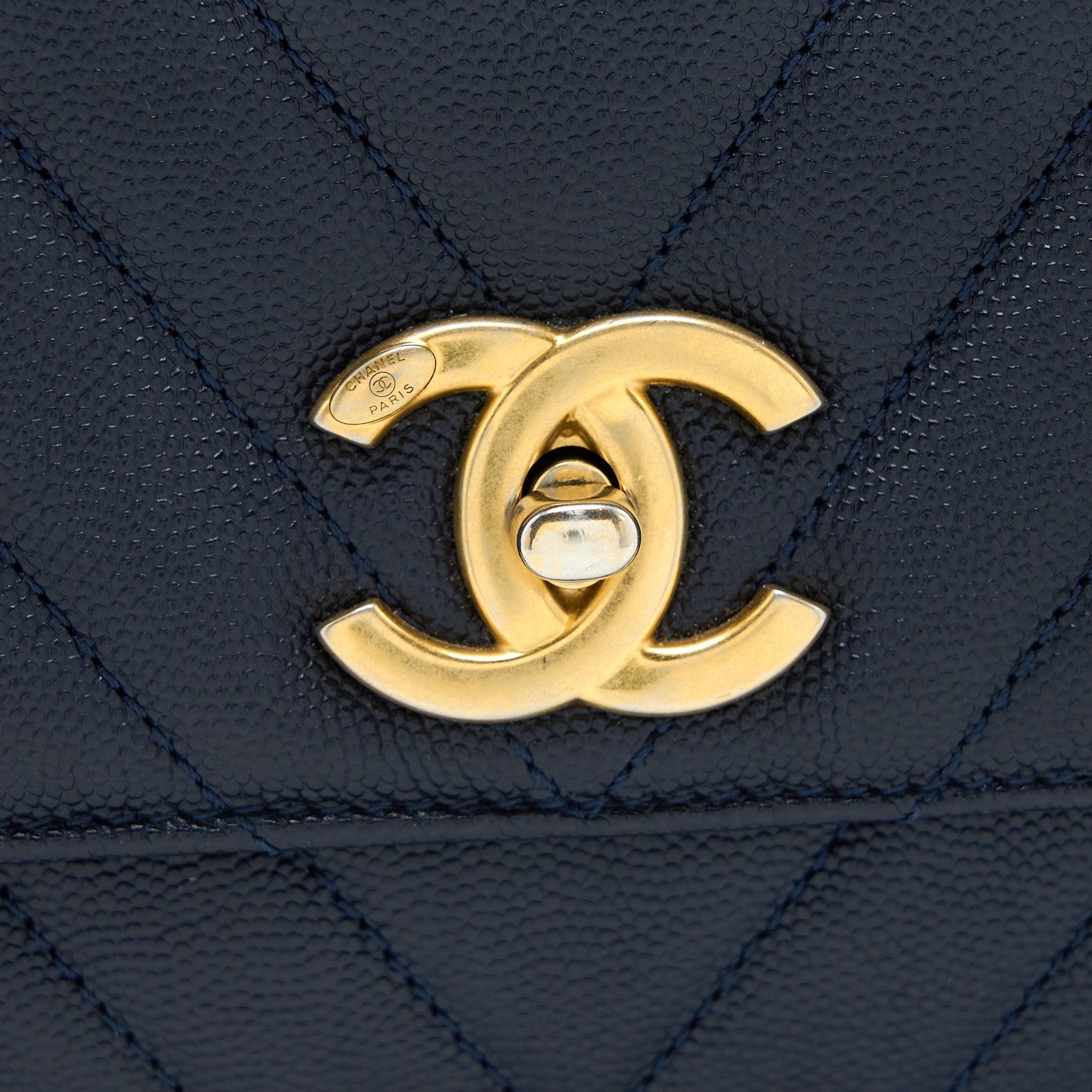 chanel-medium-chevron-coco-handle-bag-caviar-with-lizard-handle-navy-brushed-ghw