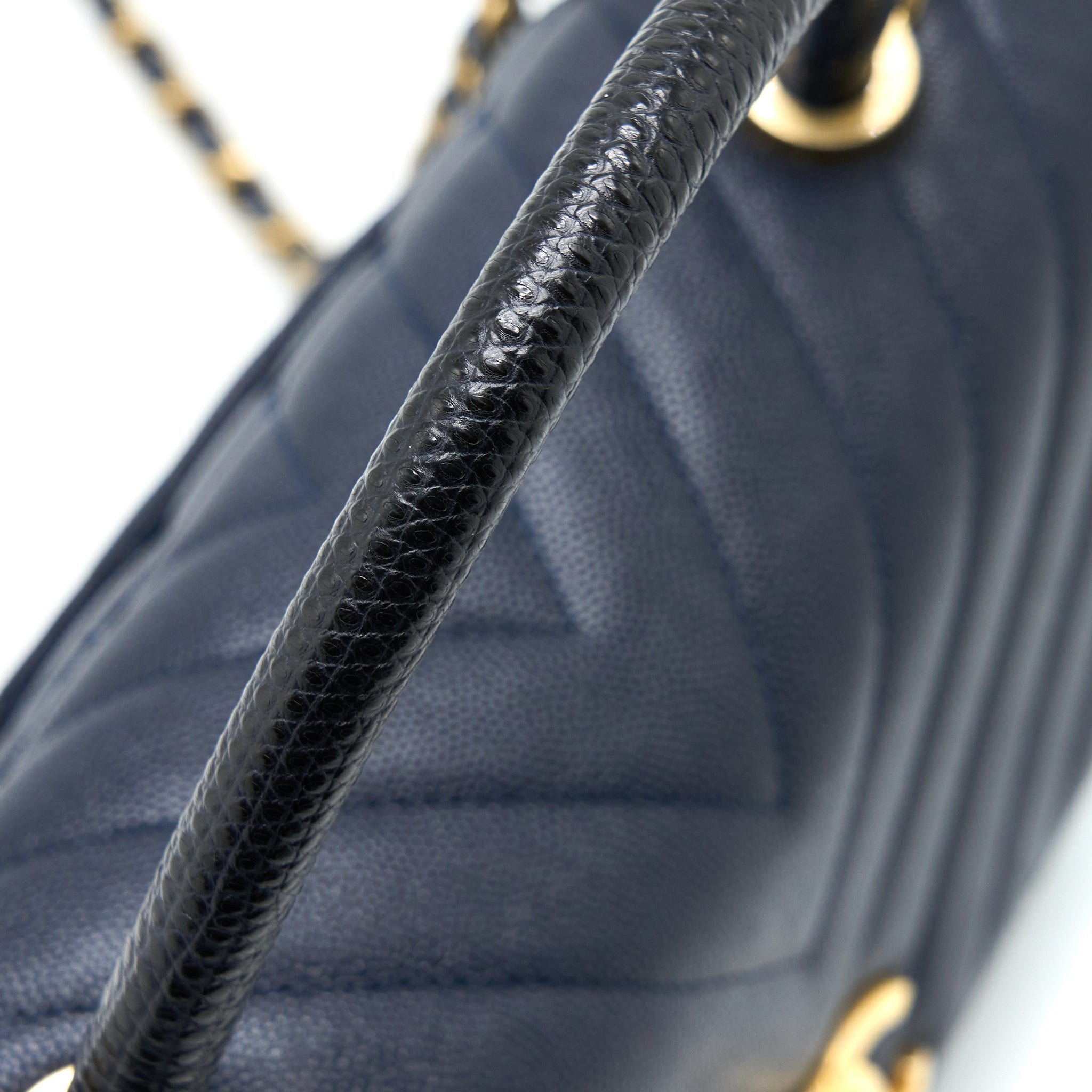 chanel-medium-chevron-coco-handle-bag-caviar-with-lizard-handle-navy-brushed-ghw