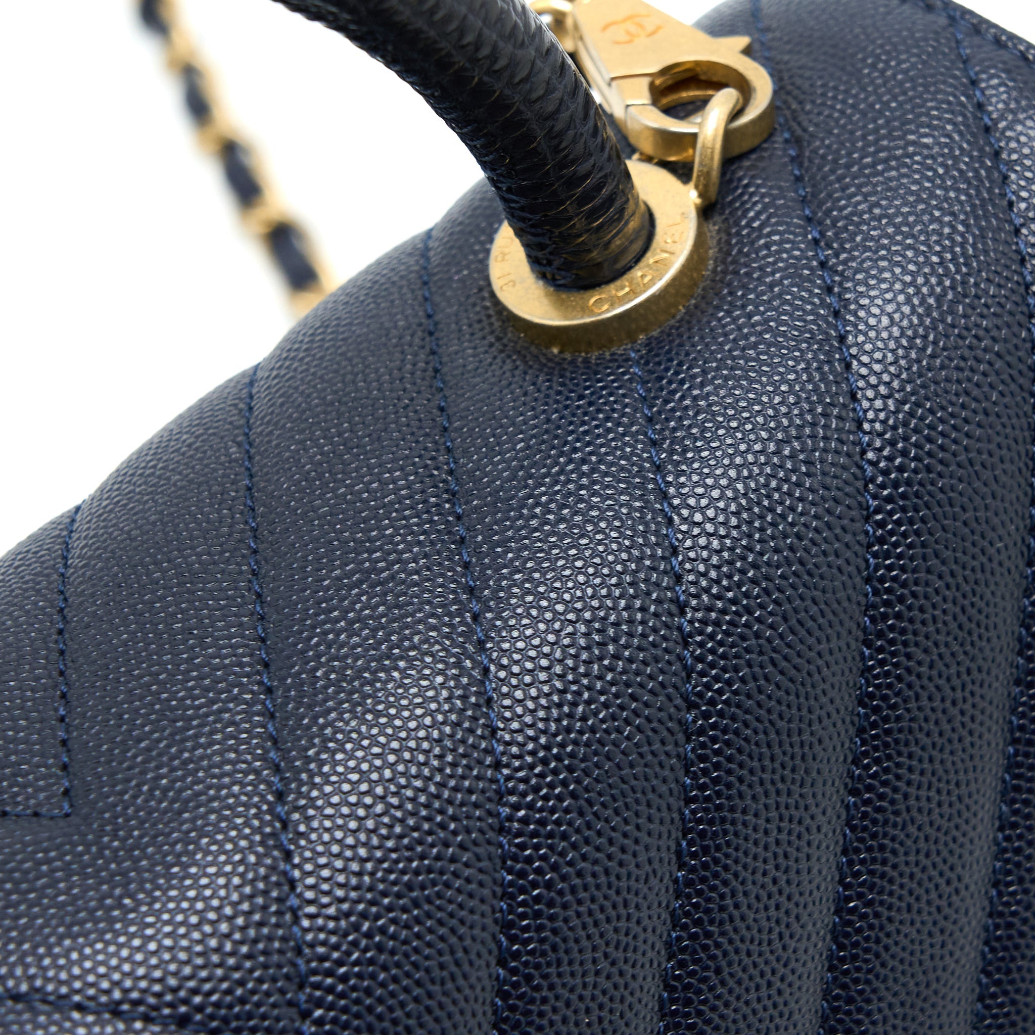 chanel-medium-chevron-coco-handle-bag-caviar-with-lizard-handle-navy-brushed-ghw