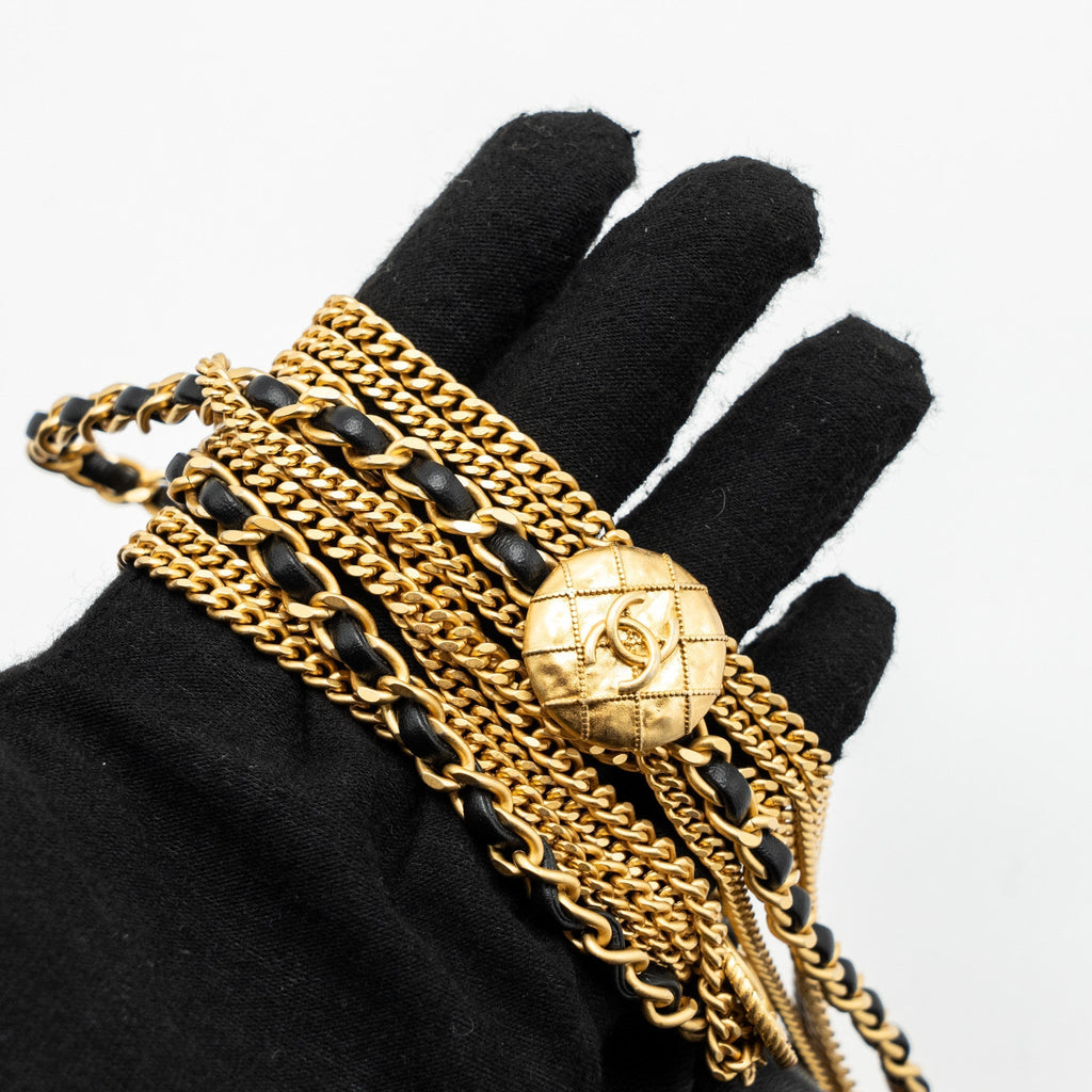 chanel-22a-button-on-chain-flap-shoulder-bag-lambskin-black-brushed-ghwmicrochip