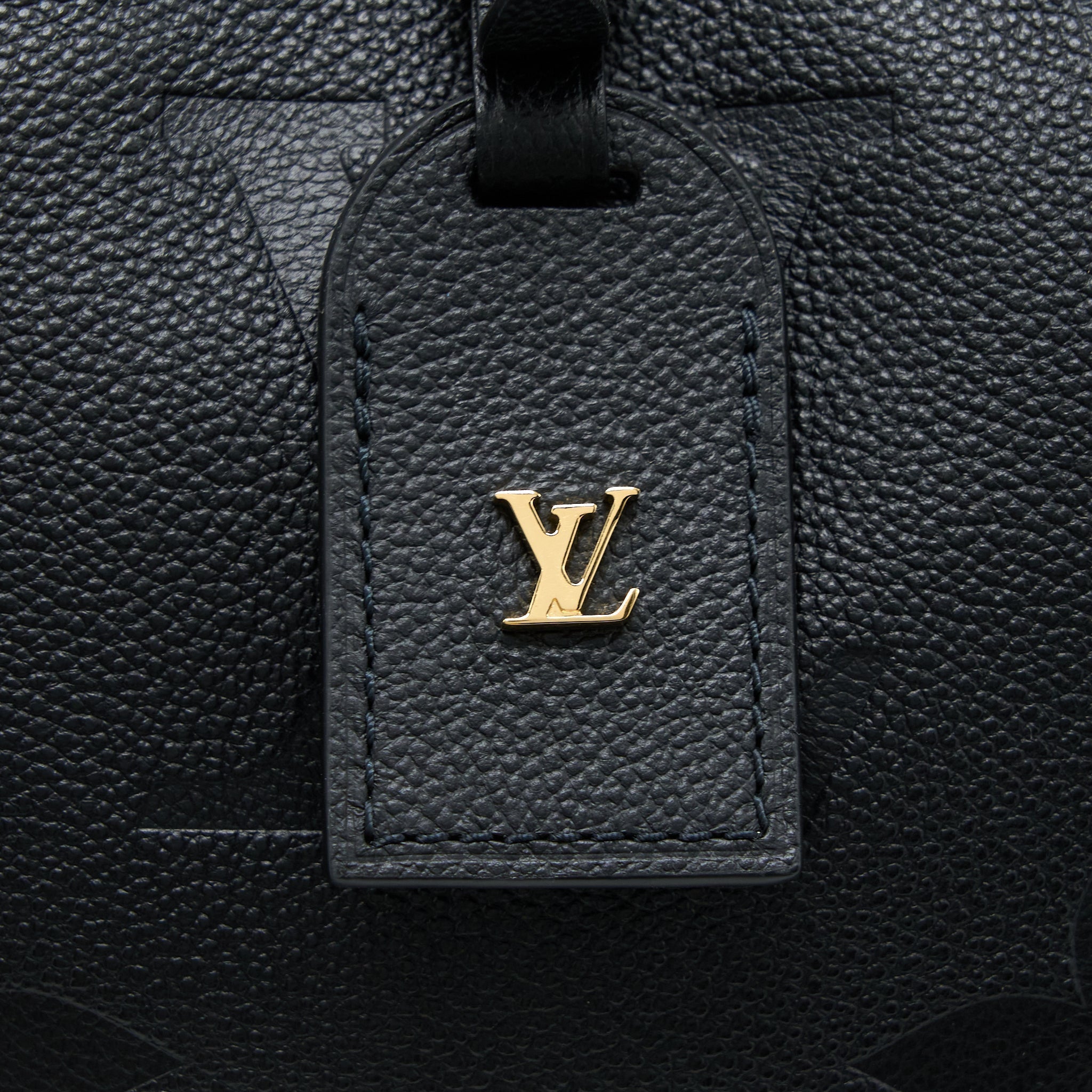 louis-vuitton-carryall-mm-empreinte-black-ghw-new-version