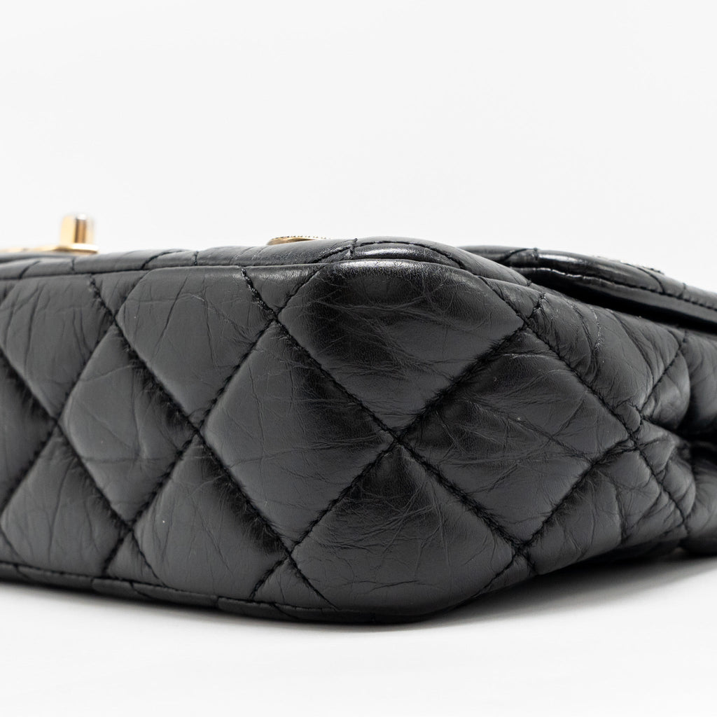 chanel-medallion-quilted-flap-bag-aged-calfskin-black-multicolour-hardware