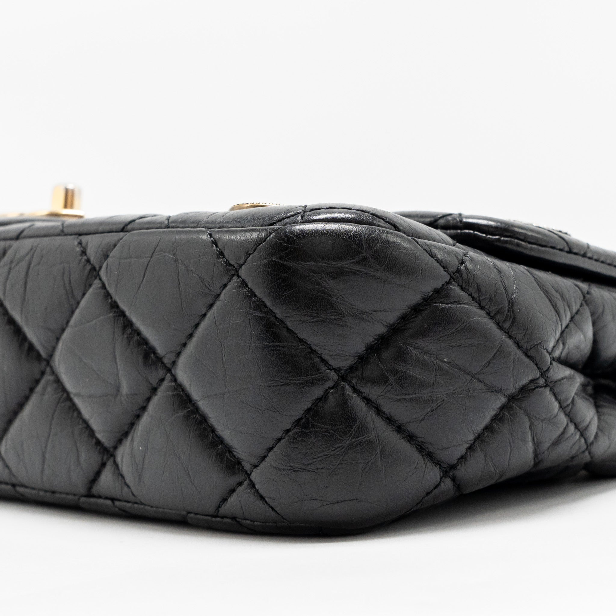 chanel-medallion-quilted-flap-bag-aged-calfskin-black-multicolour-hardware