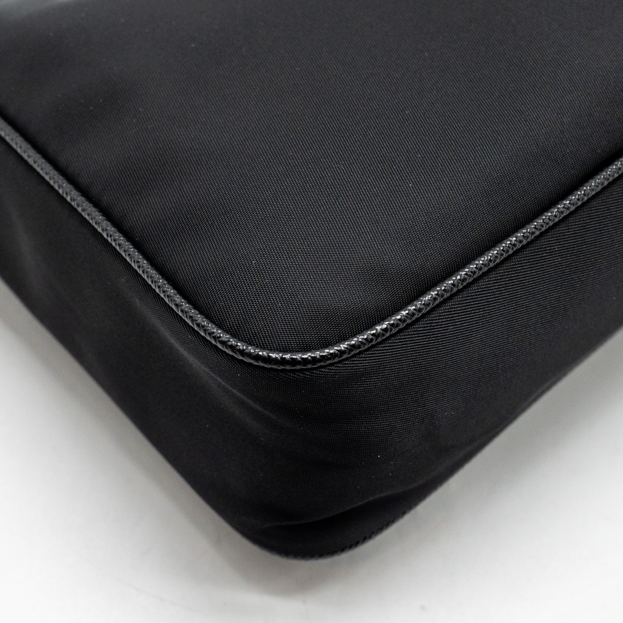 prada-re-edition-2005-re-nylon-and-saffiano-mini-bag-black-shw