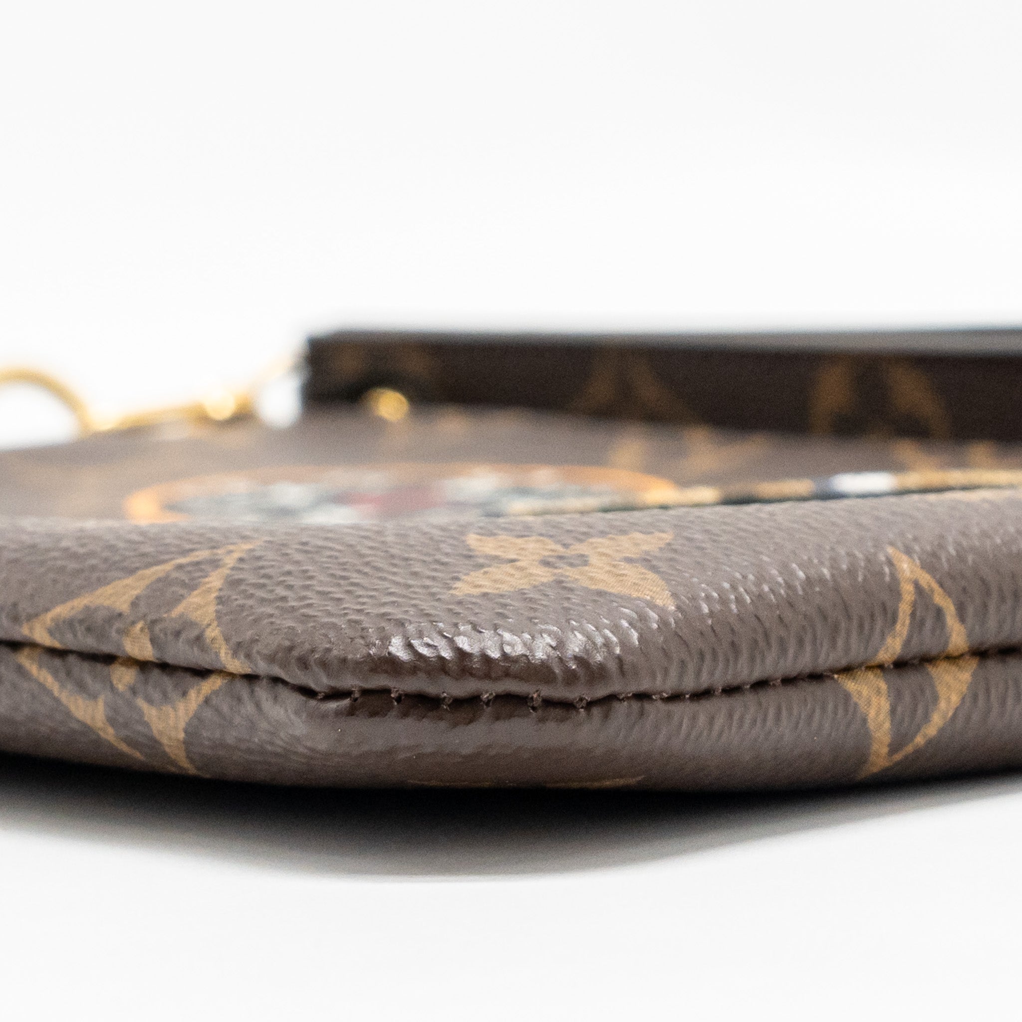 louis-vuitton-travel-stickers-city-pouch-monogram-canvas-ghw