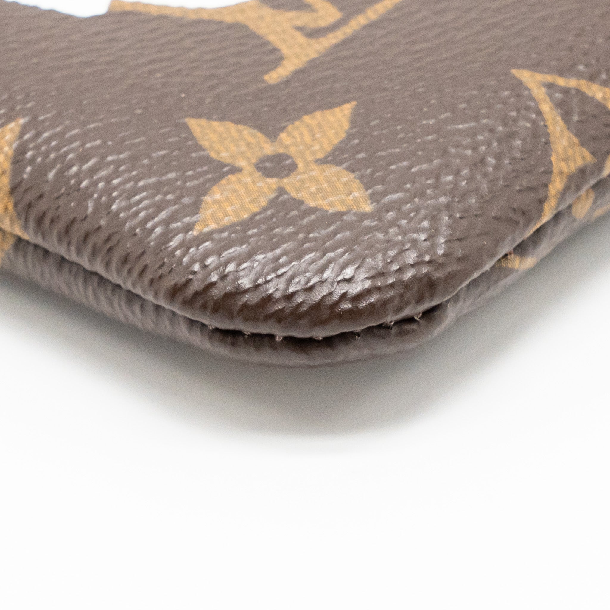 louis-vuitton-travel-stickers-city-pouch-monogram-canvas-ghw