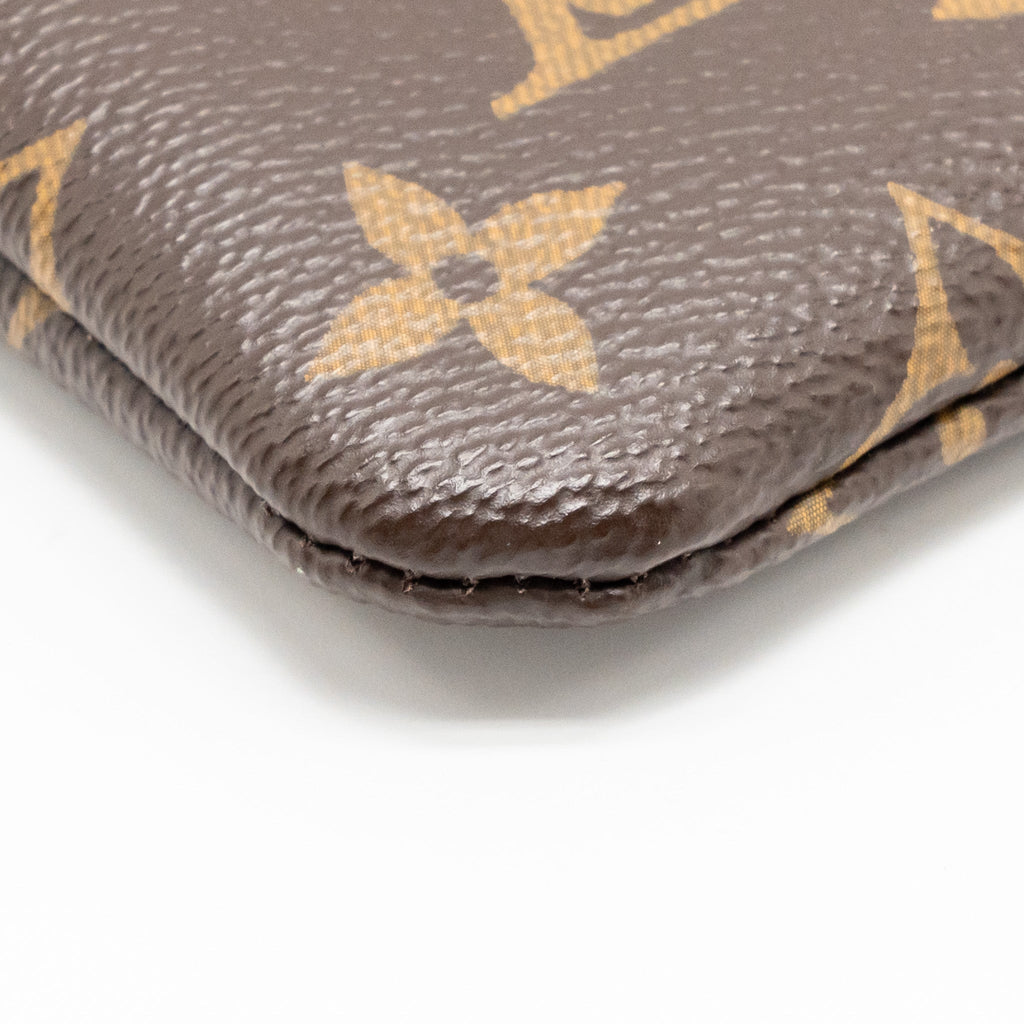 louis-vuitton-travel-stickers-city-pouch-monogram-canvas-ghw