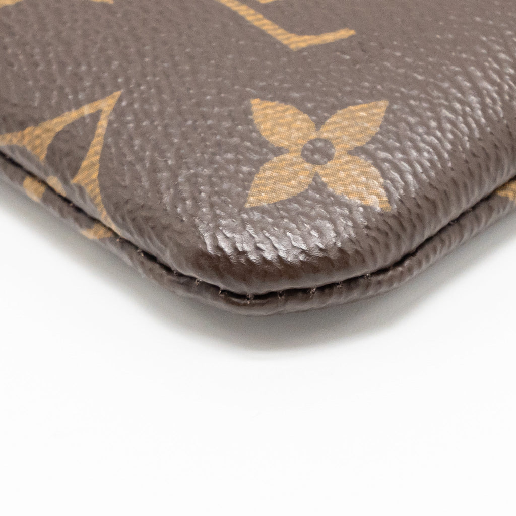 louis-vuitton-travel-stickers-city-pouch-monogram-canvas-ghw