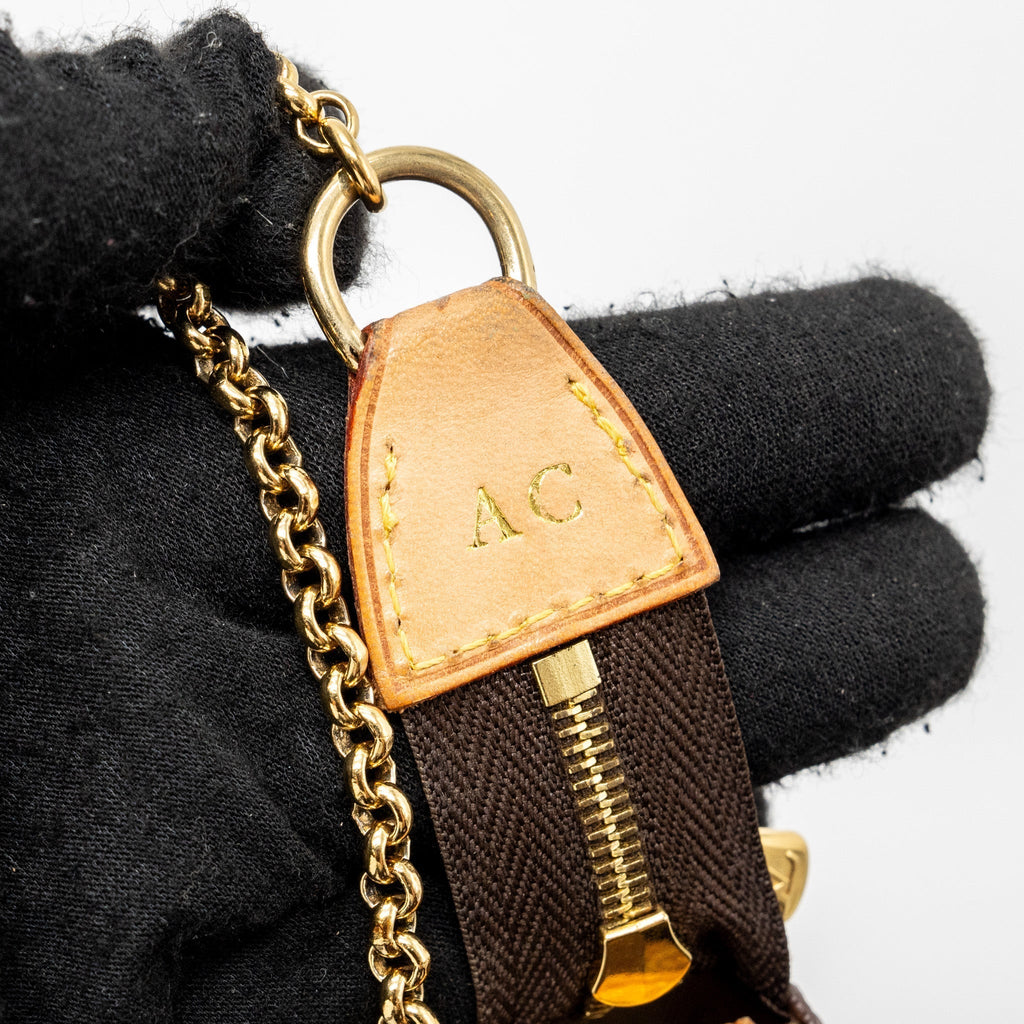 louis-vuitton-eva-pochette-monogram-canvas-ghw-2