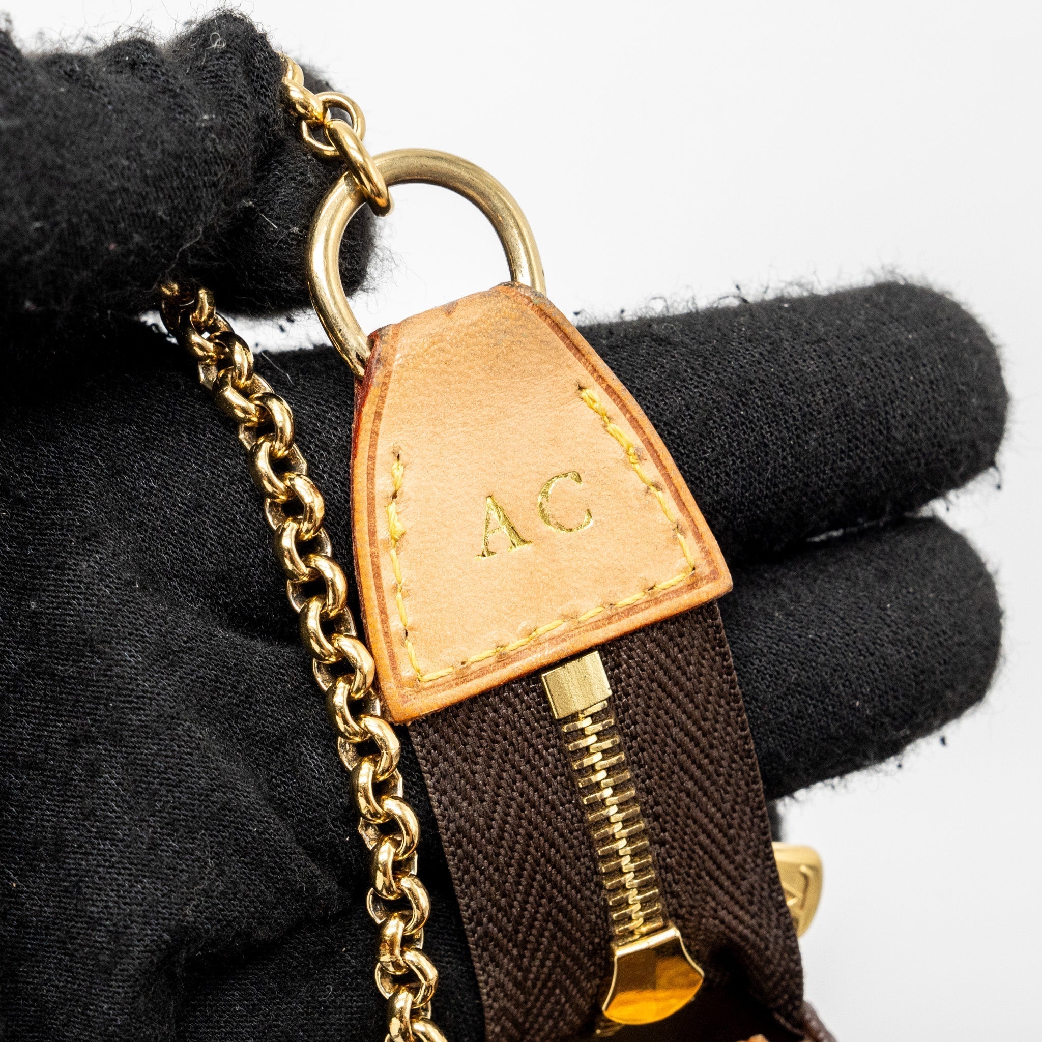 louis-vuitton-eva-pochette-monogram-canvas-ghw-2