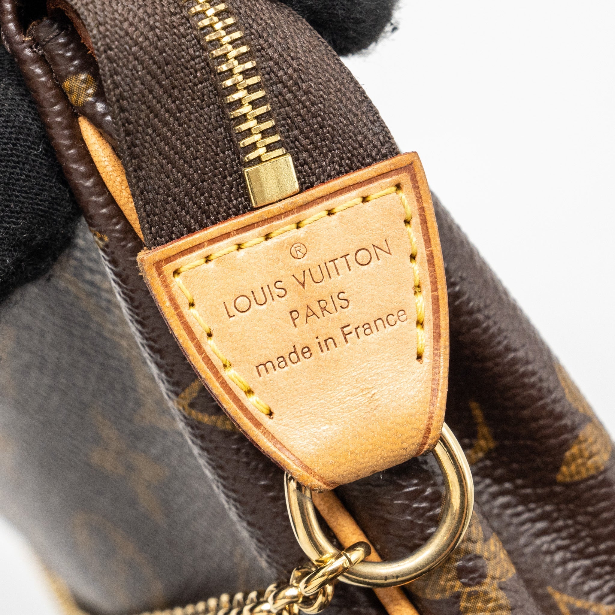 louis-vuitton-eva-pochette-monogram-canvas-ghw-2