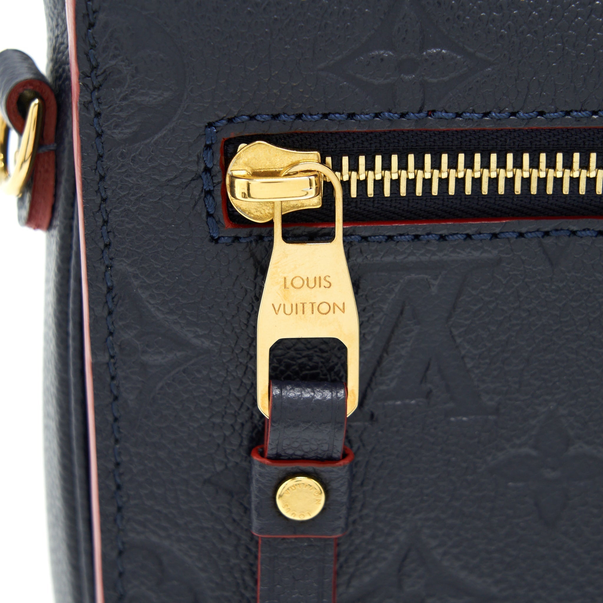 louis-vuitton-pochette-metis-monogram-empreinte-marine-rouge-ghw