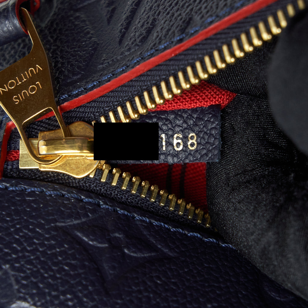 louis-vuitton-pochette-metis-monogram-empreinte-marine-rouge-ghw