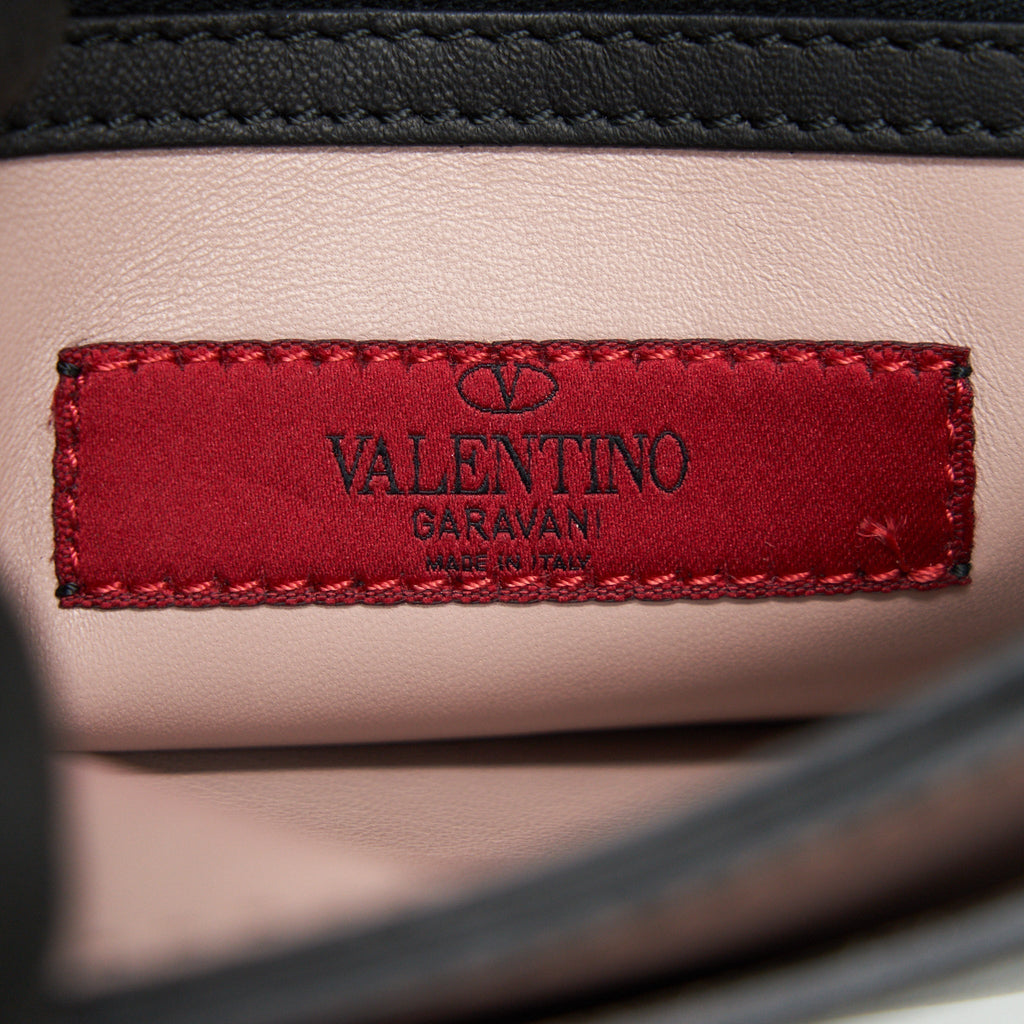 valentino-garavani-rockstud-leather-clutch-bag-black