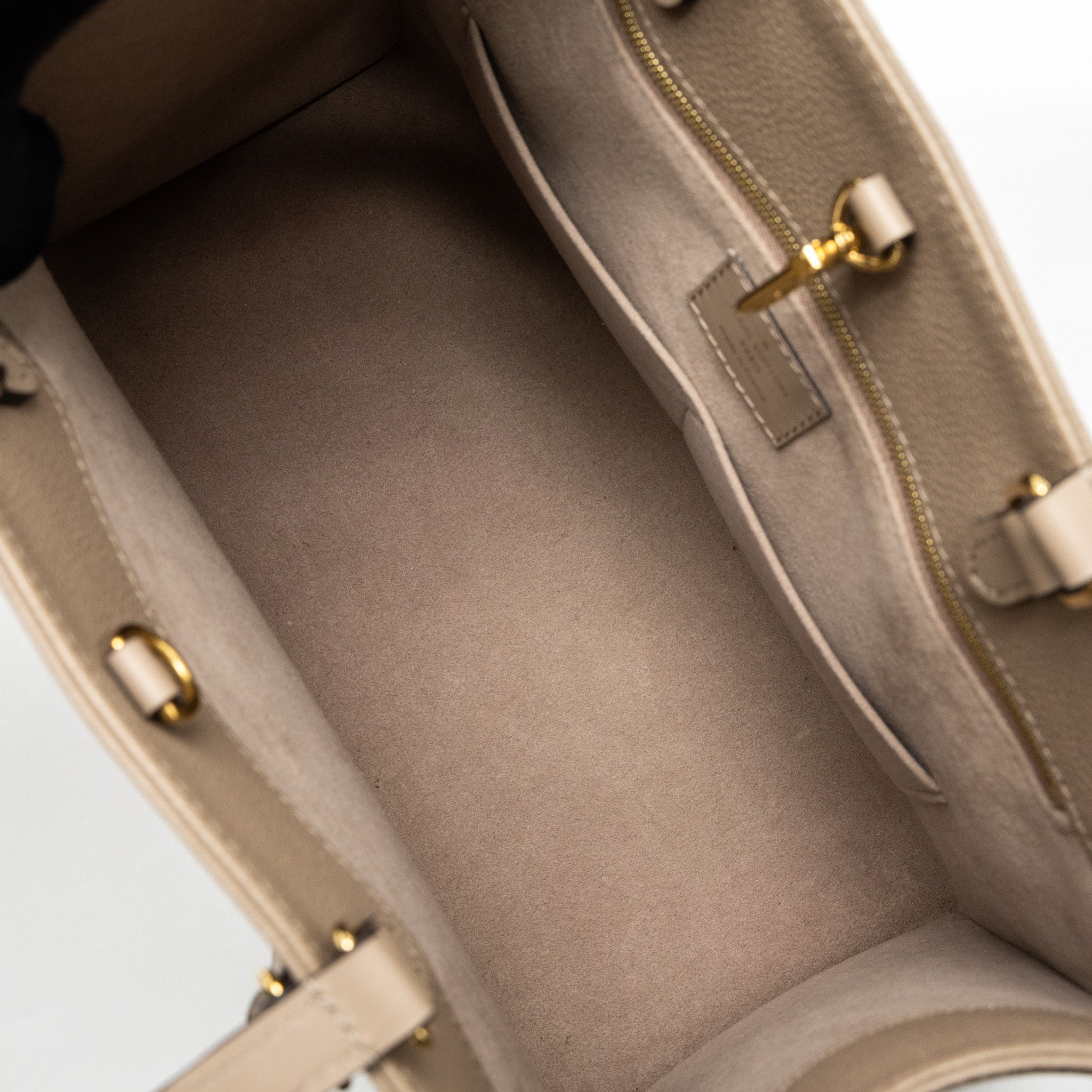copy-of-louis-vuitton-on-the-go-mm-monogram-empreinte-tourterelle-ghw