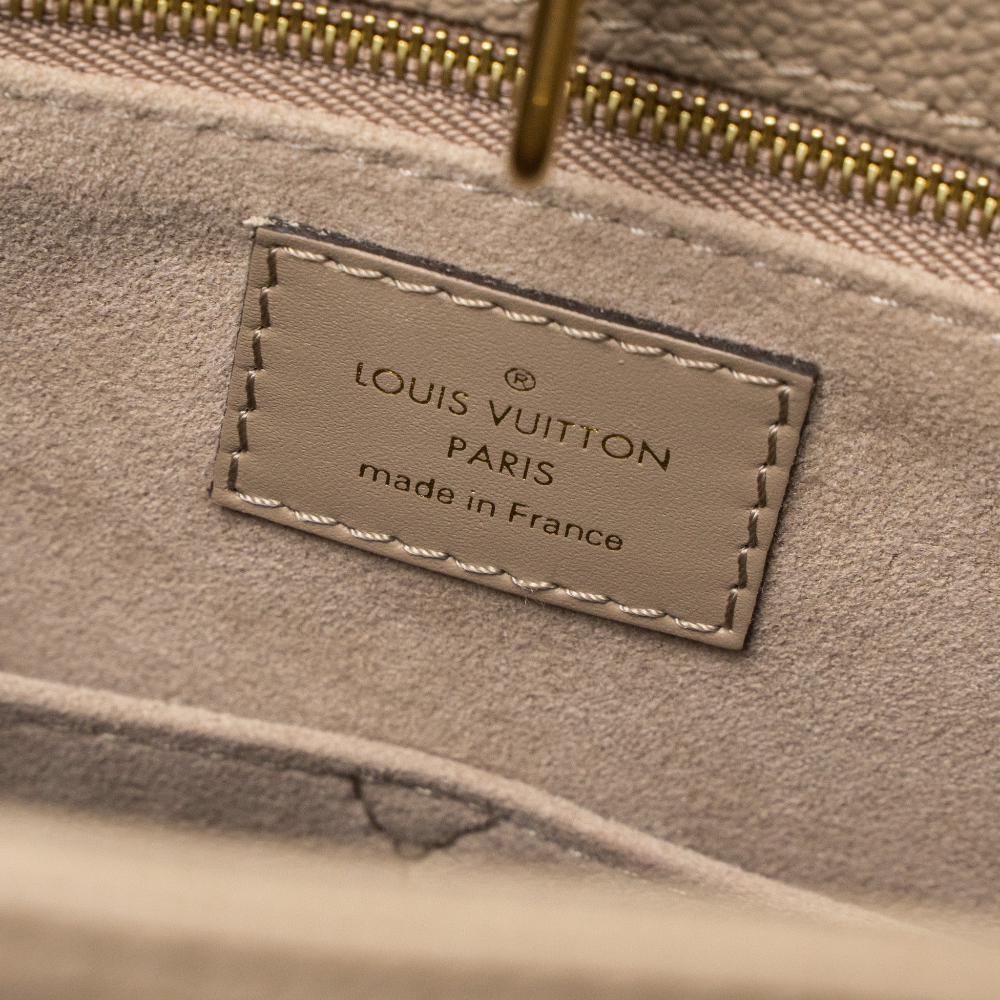 copy-of-louis-vuitton-on-the-go-mm-monogram-empreinte-tourterelle-ghw
