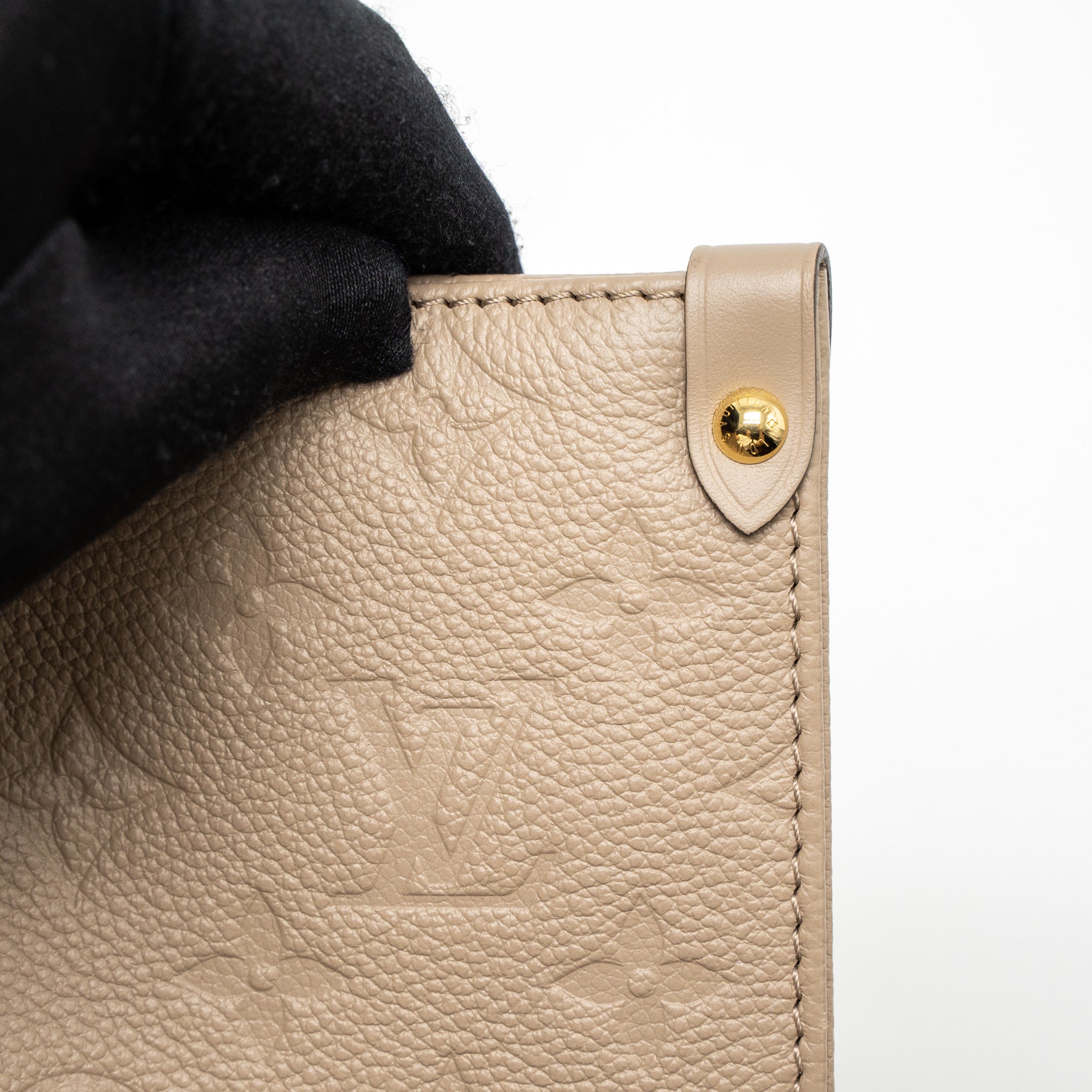 copy-of-louis-vuitton-on-the-go-mm-monogram-empreinte-tourterelle-ghw