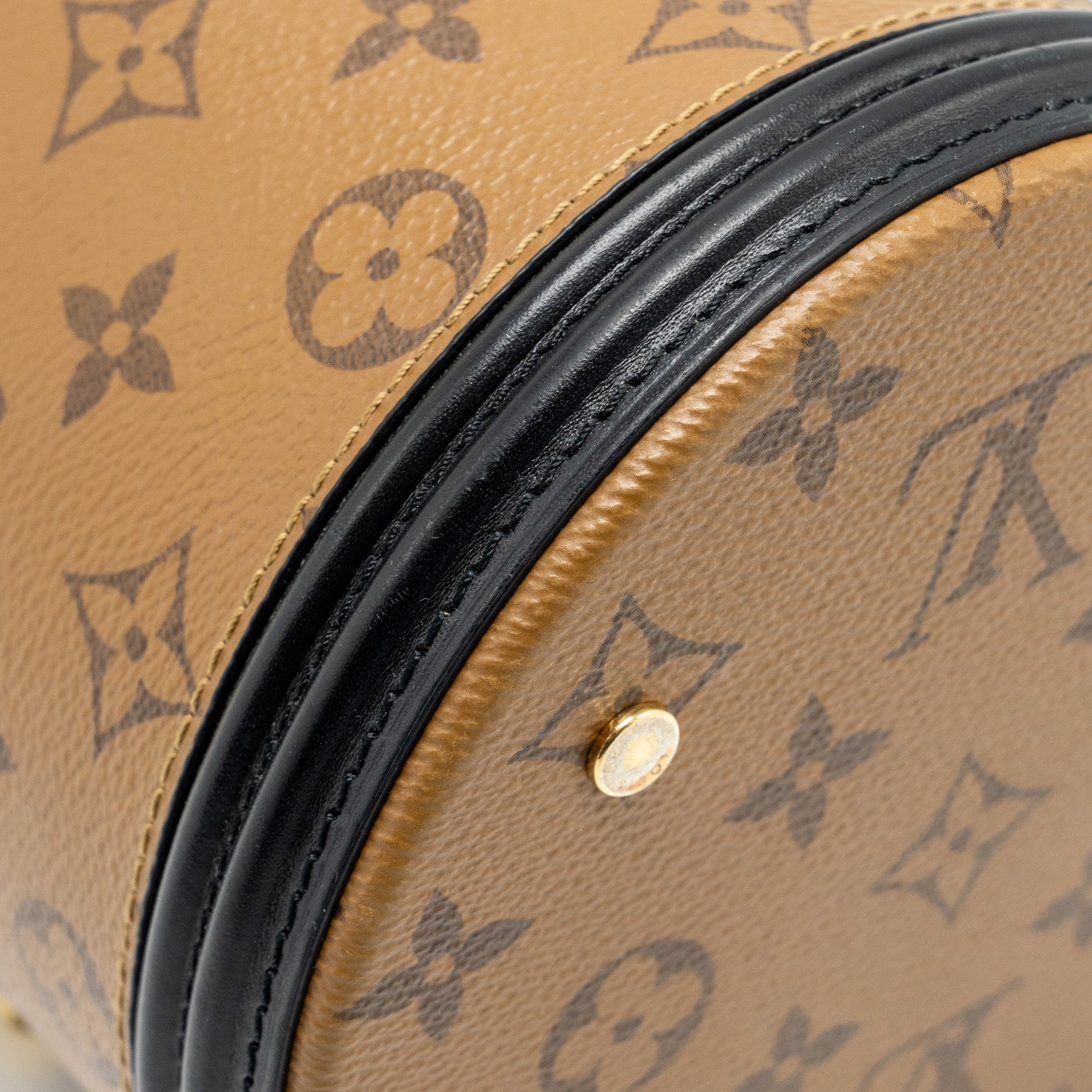 louis-vuitton-cannes-monogram-reverse-canvas-ghw-9