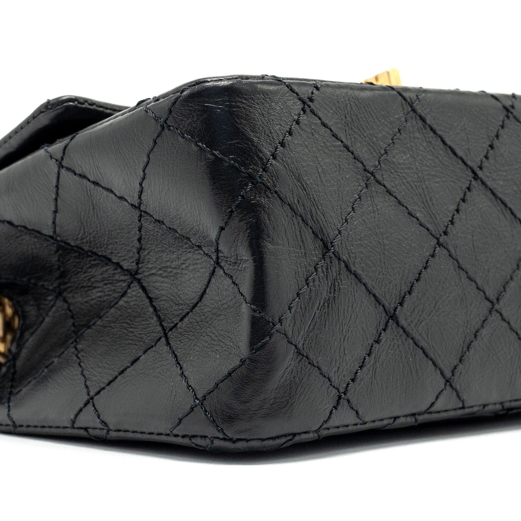 chanel-mini-2-55-reissue-flap-bag-aged-calfskin-black-ghw-1