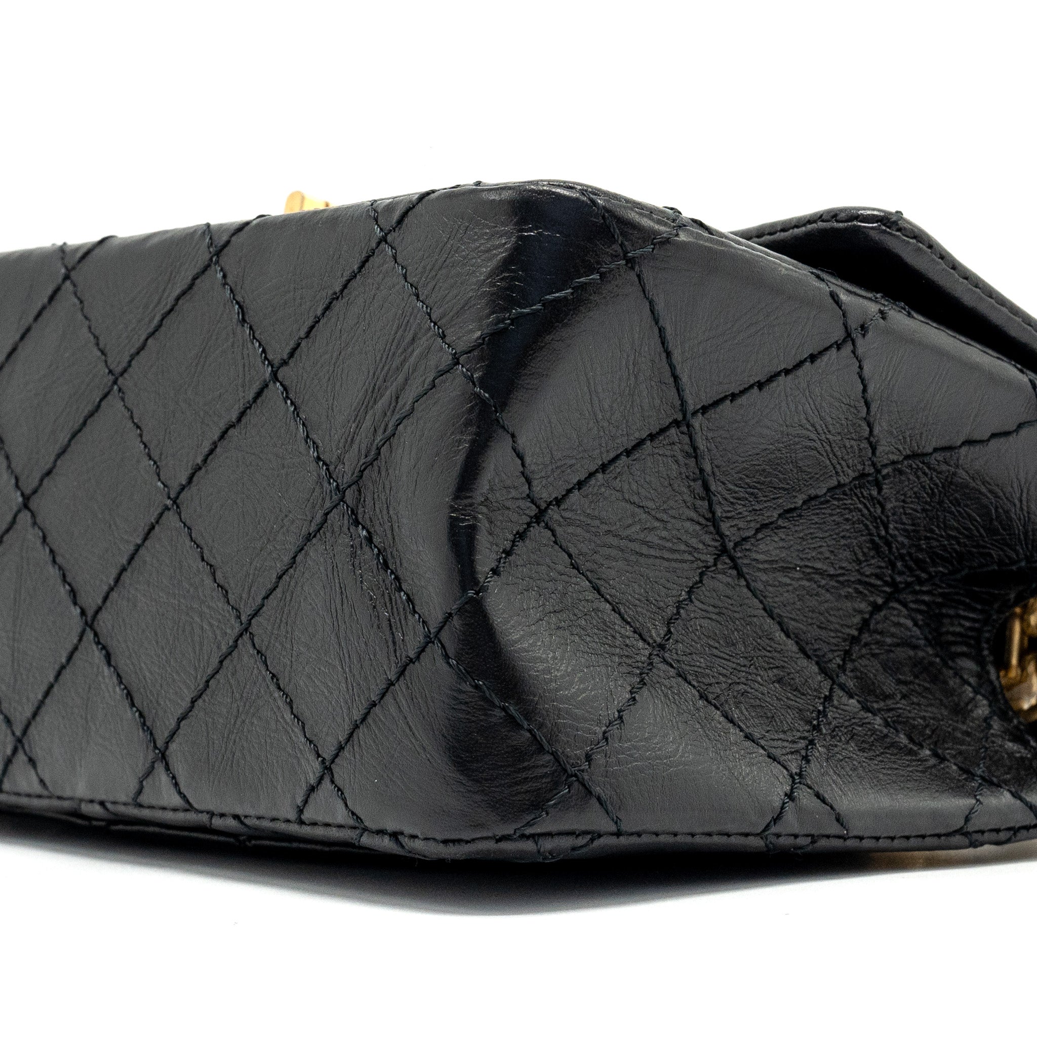 chanel-mini-2-55-reissue-flap-bag-aged-calfskin-black-ghw-1