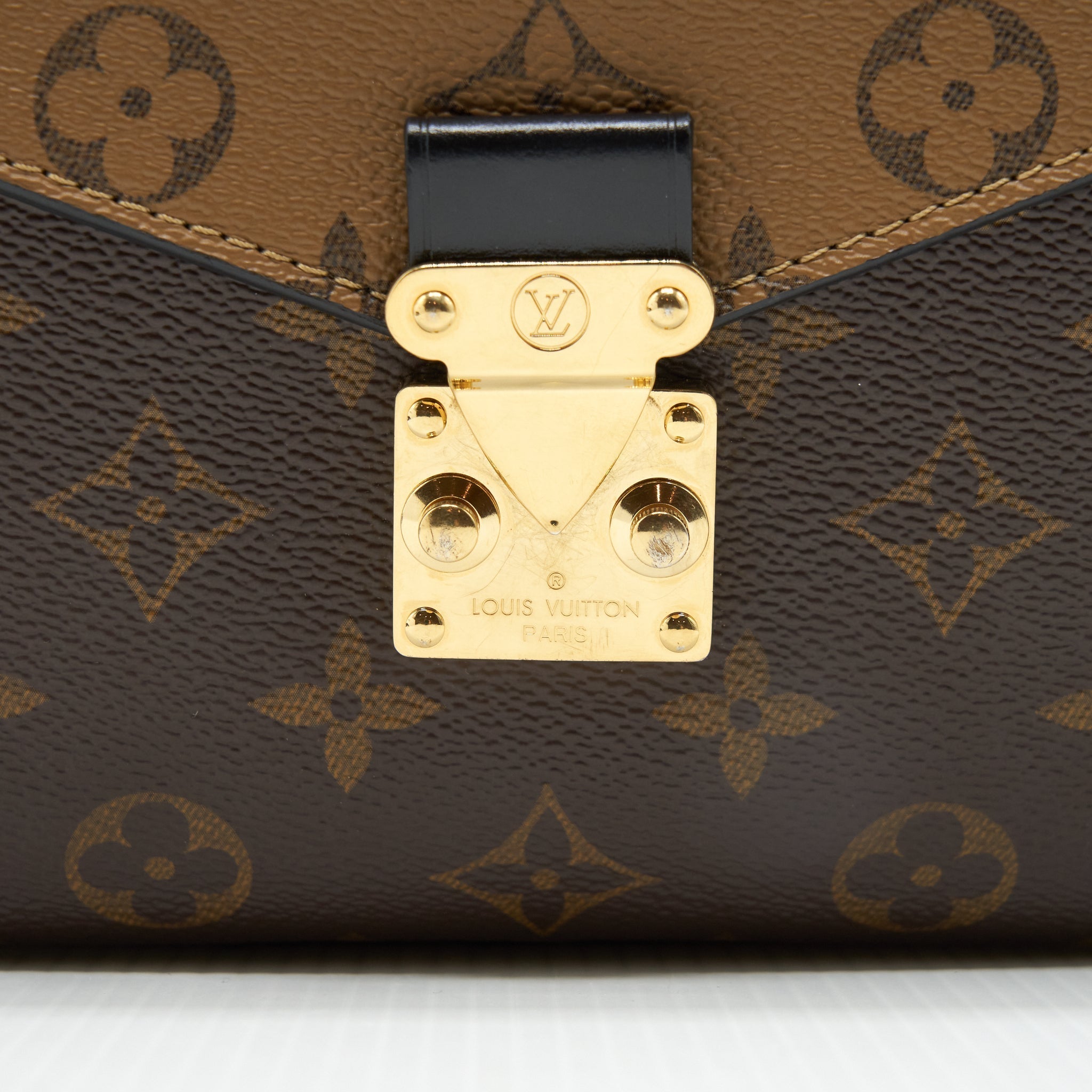 louis-vuitton-pochette-metis-reverse-monogram-canvas-ghw