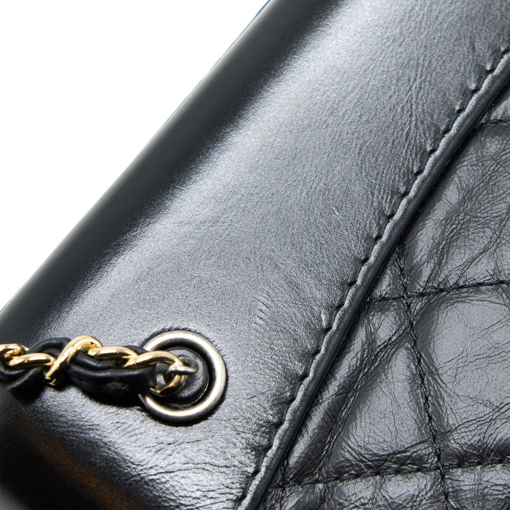 chanel-small-gabrielle-backpack-aged-calfskin-black-multicolour-hardware-1