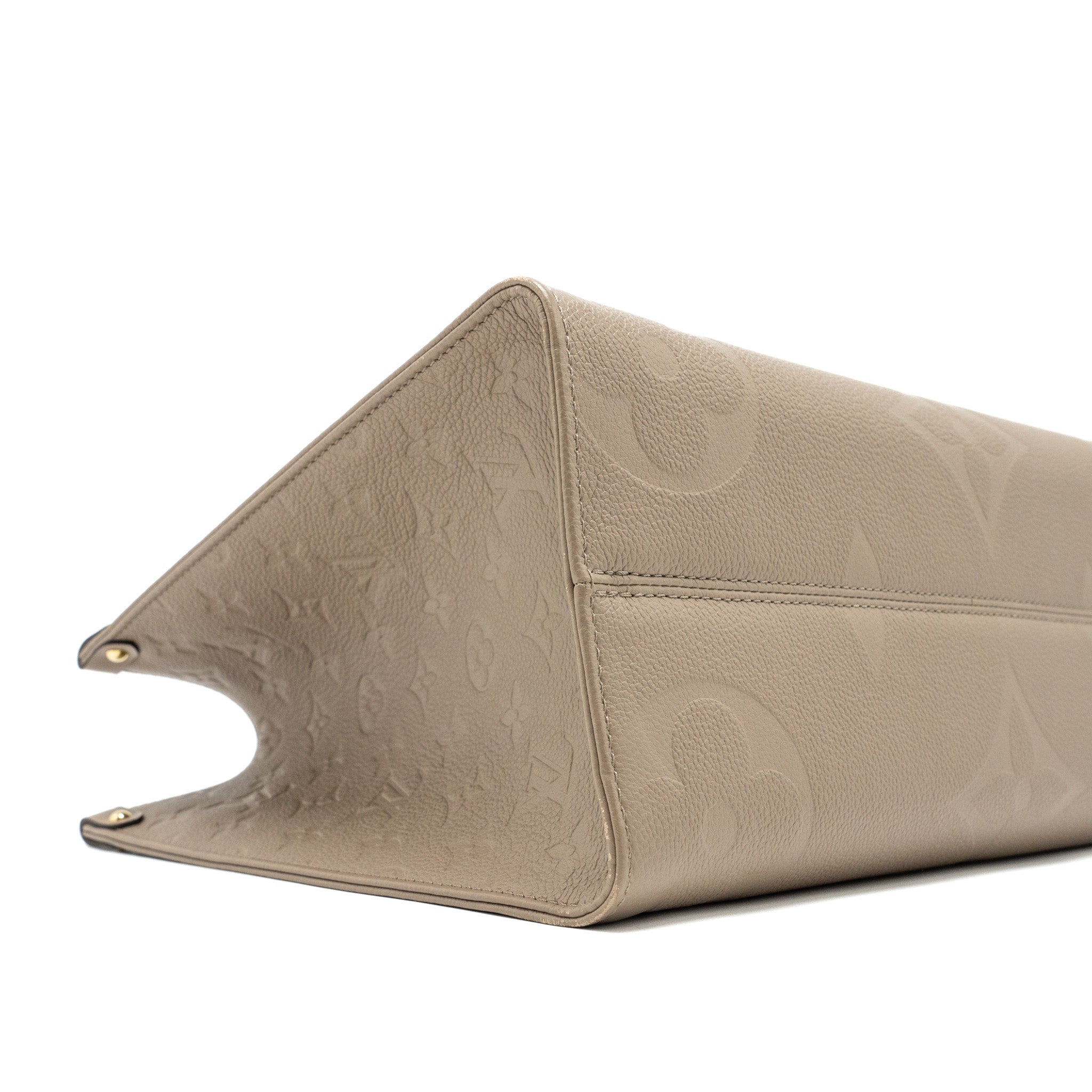 copy-of-louis-vuitton-on-the-go-mm-monogram-empreinte-tourterelle-ghw