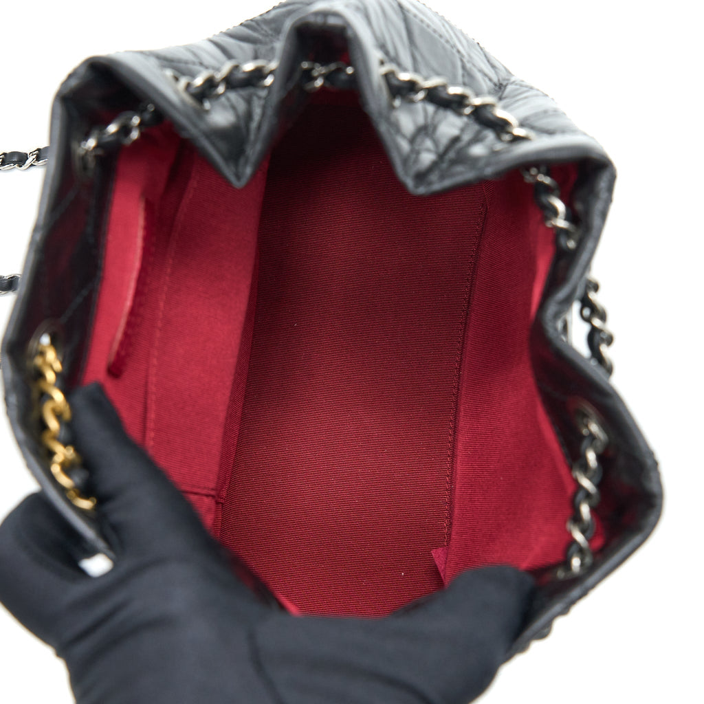 chanel-small-gabrielle-backpack-aged-calfskin-black-multicolour-hardware-1