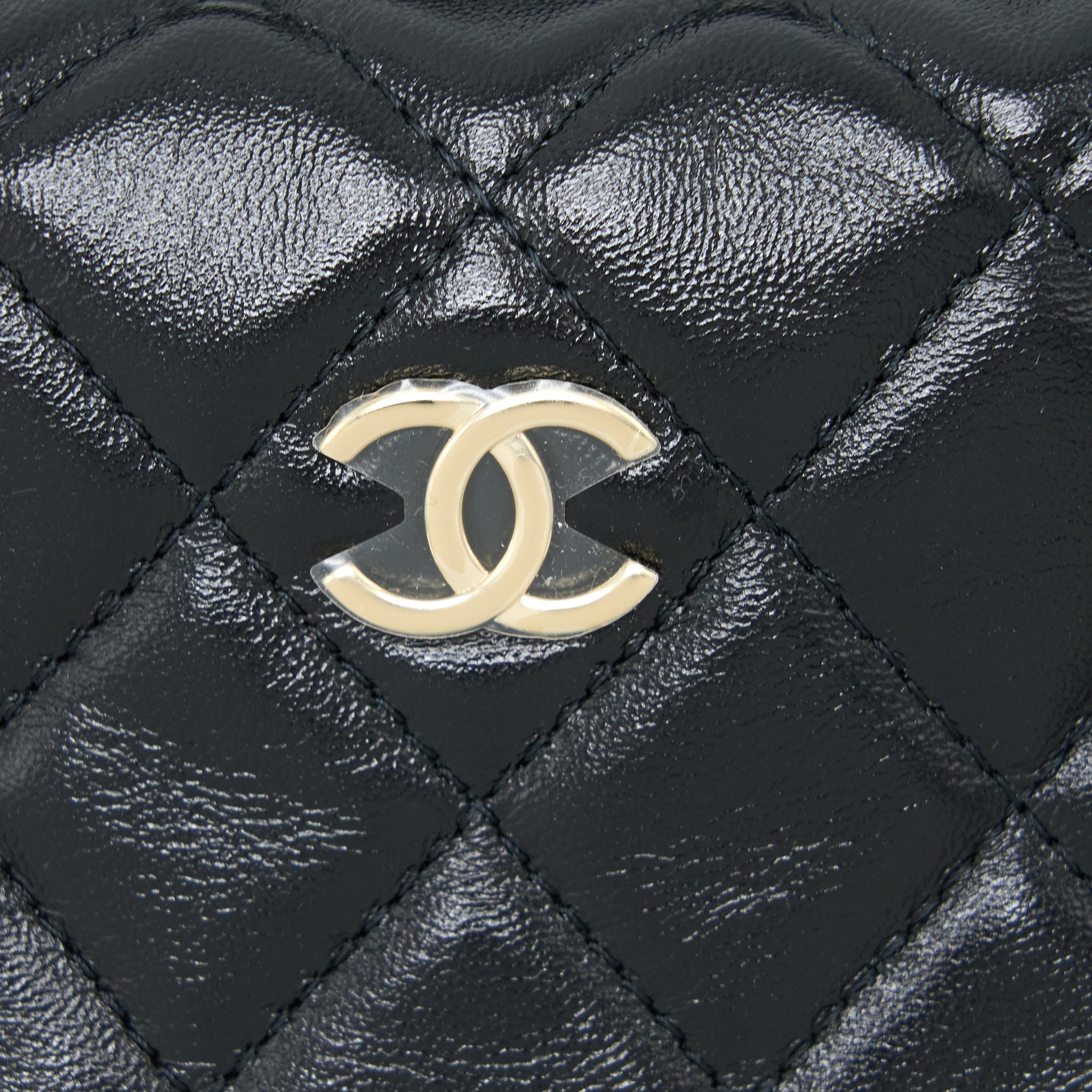chanel-23c-round-cruise-pouch-lambskin-black-lghw-microchip