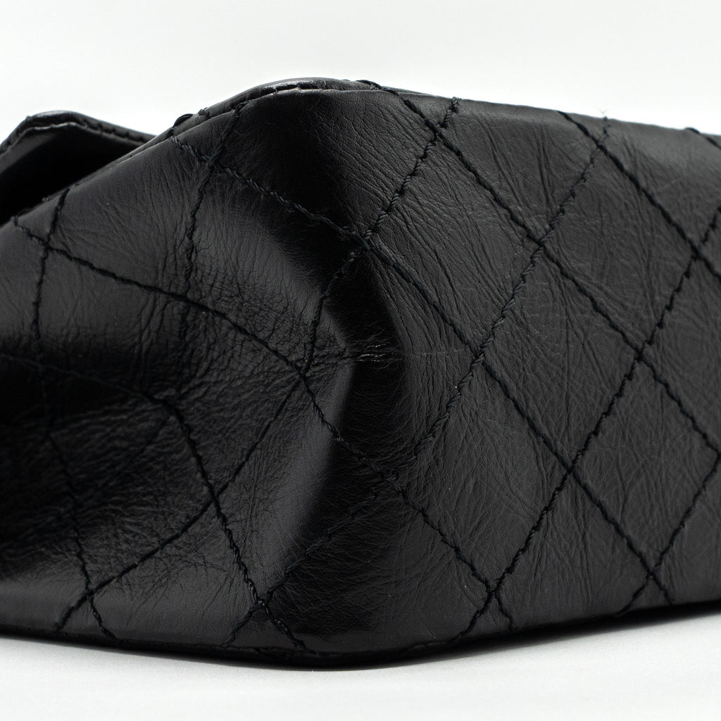 chanel-mini-2-55-reissue-flap-bag-aged-calfskin-black-ghw