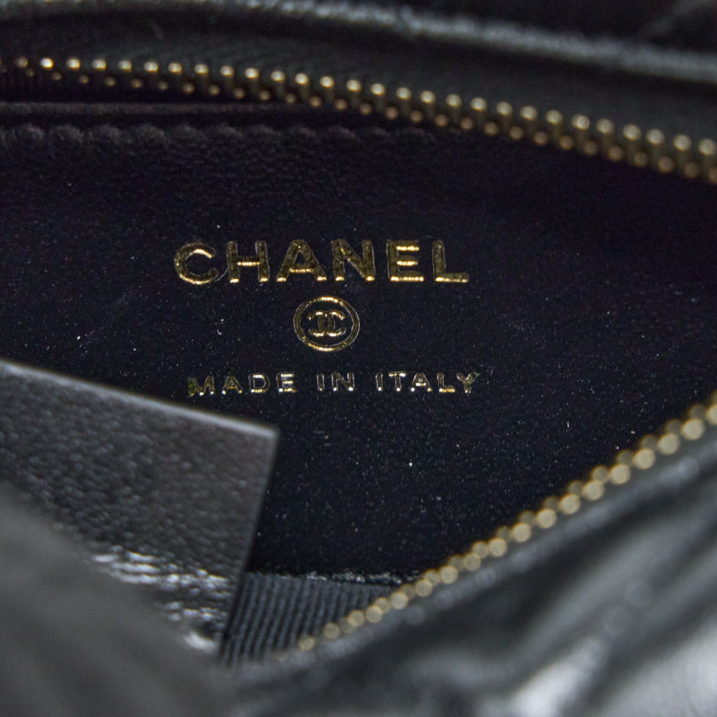 chanel-23c-round-cruise-pouch-lambskin-black-lghw-microchip