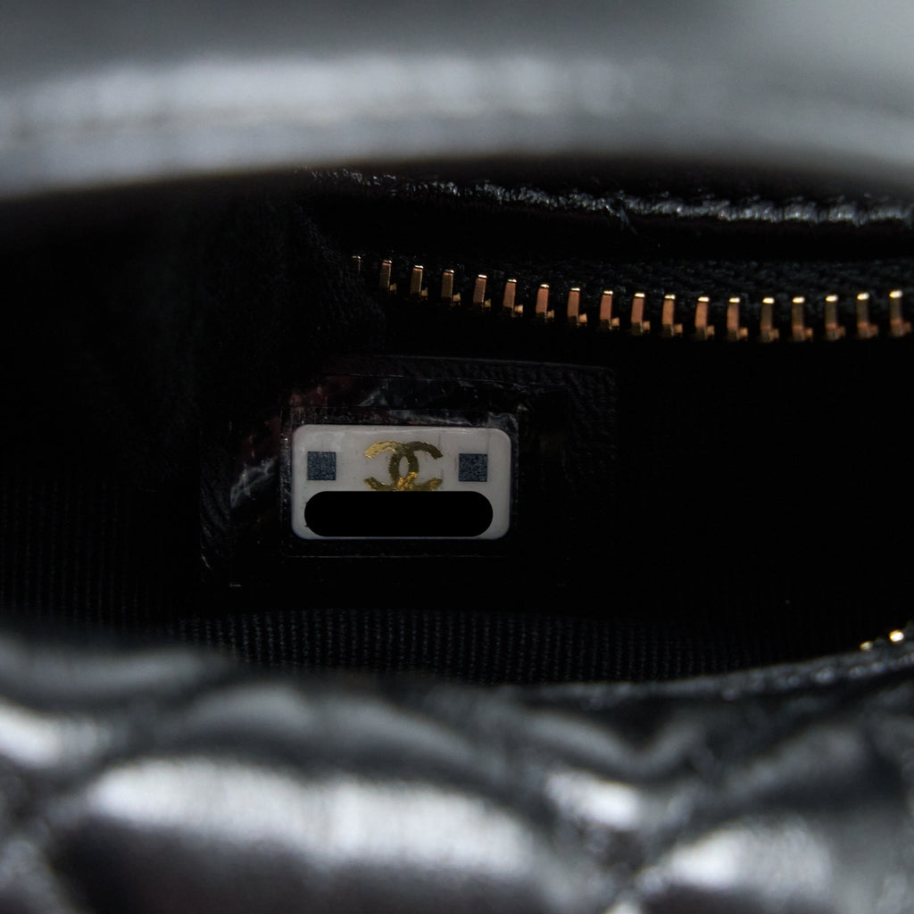 chanel-23c-round-cruise-pouch-lambskin-black-lghw-microchip