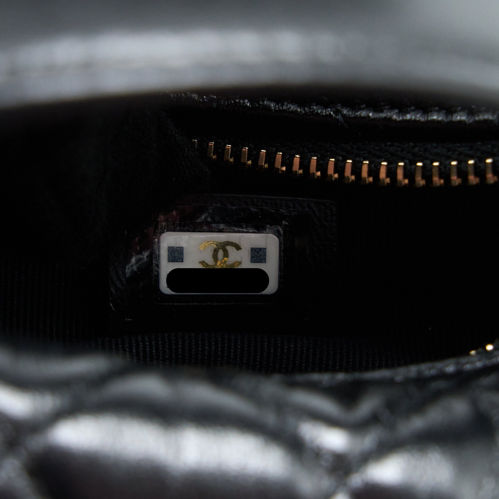 chanel-23c-round-cruise-pouch-lambskin-black-lghw-microchip
