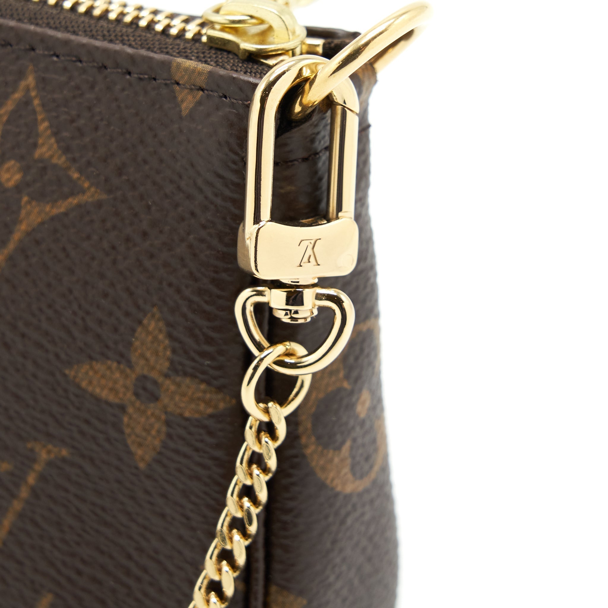 louis-vuitton-mini-pochette-accessories-monogram-canvas-ghw-1