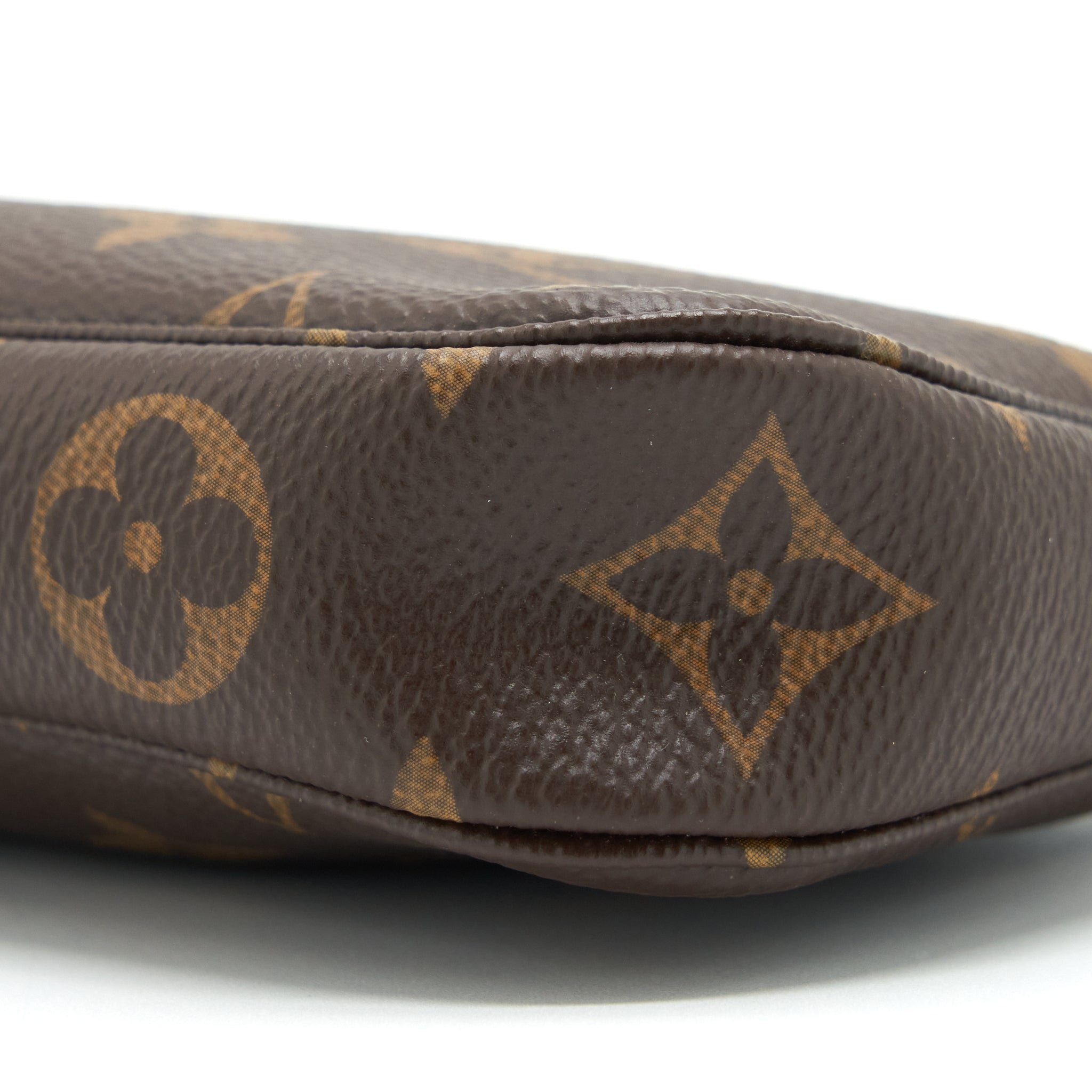 louis-vuitton-mini-pochette-accessories-monogram-canvas-ghw-1