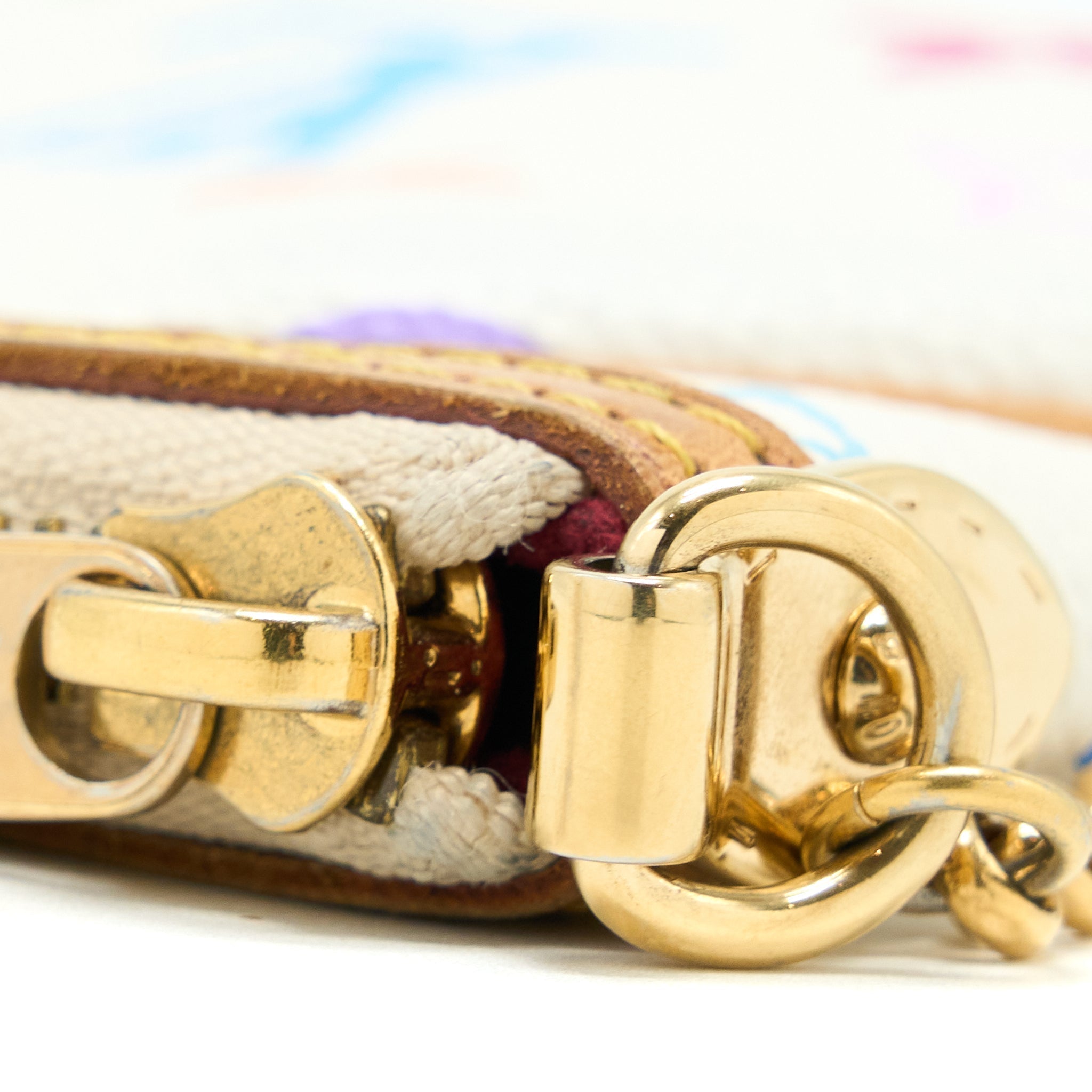 louis-vuitton-milla-pouch-monogram-canvas-multicolour-ghw
