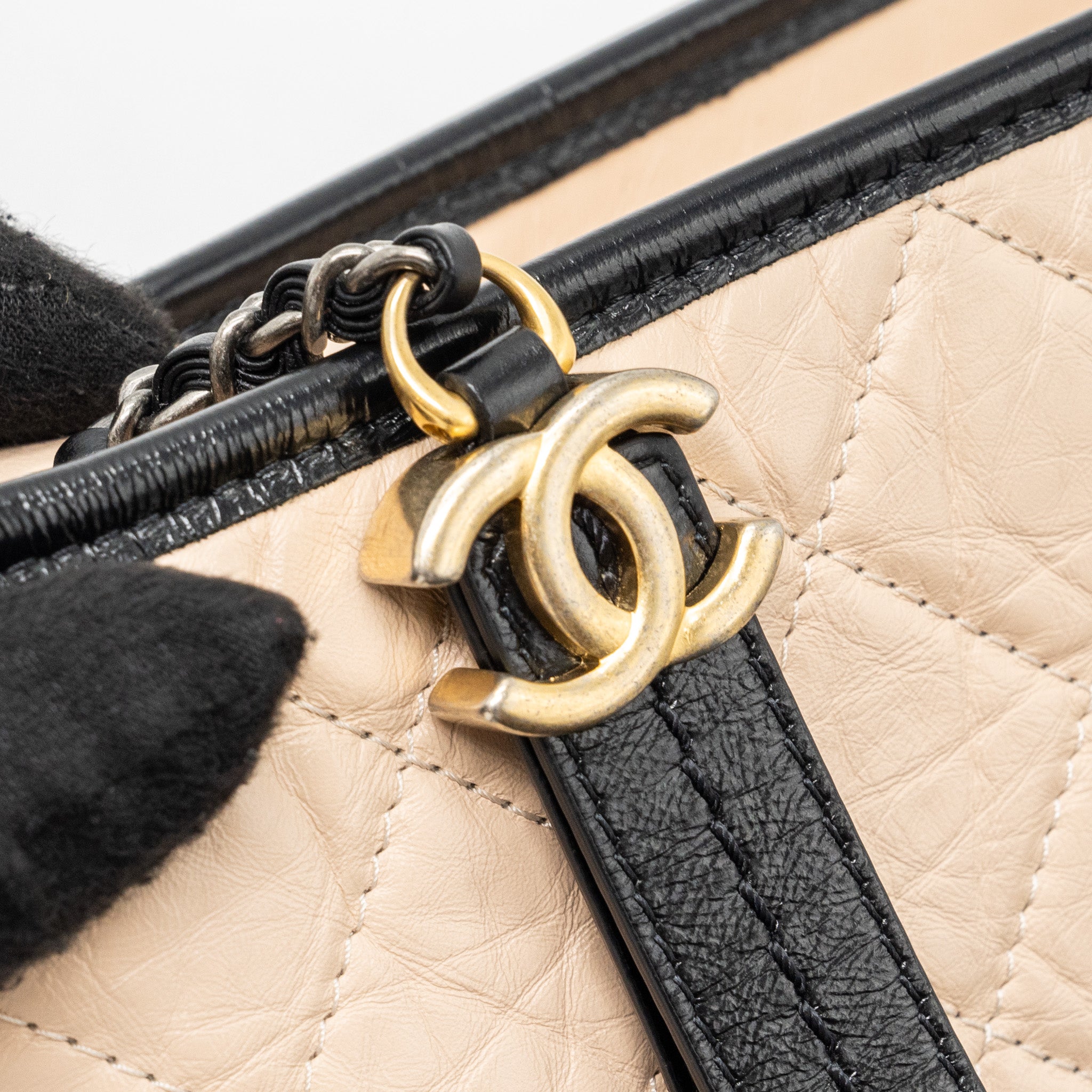 chanel-small-gabrielle-hobo-bag-aged-calfskin-beige-black-multicolour-hardware