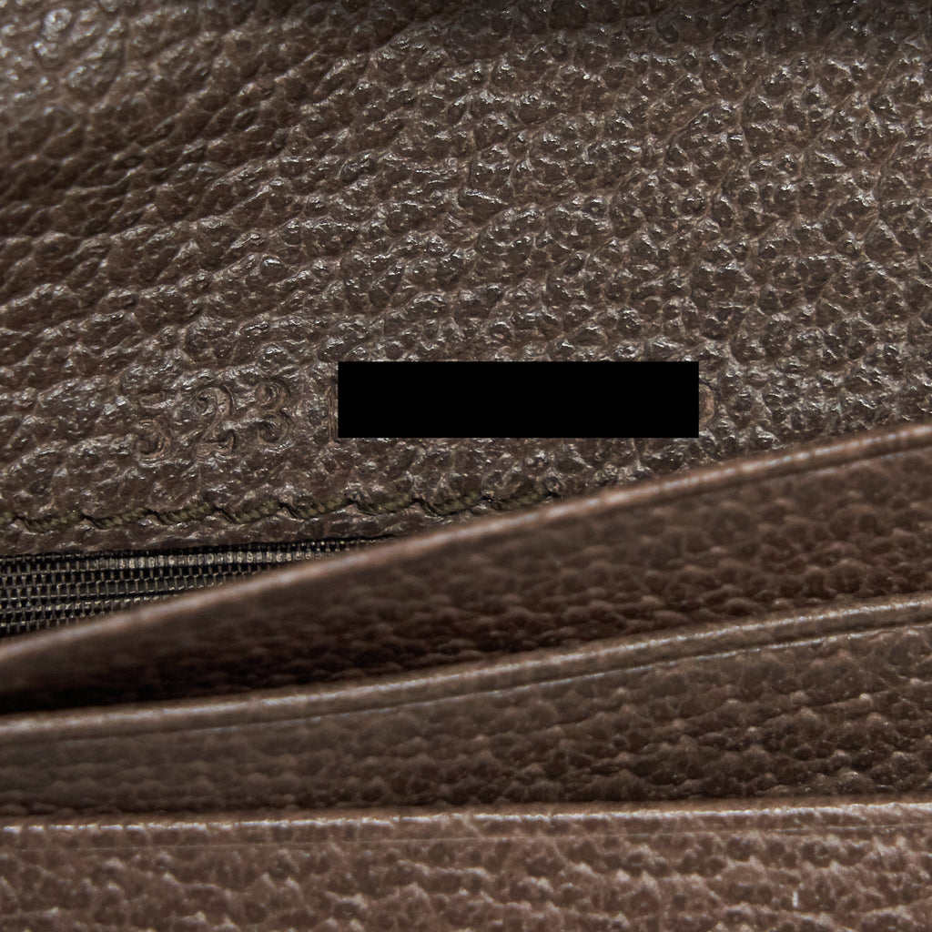 gucci-gg-canvas-bi-fold-wallet